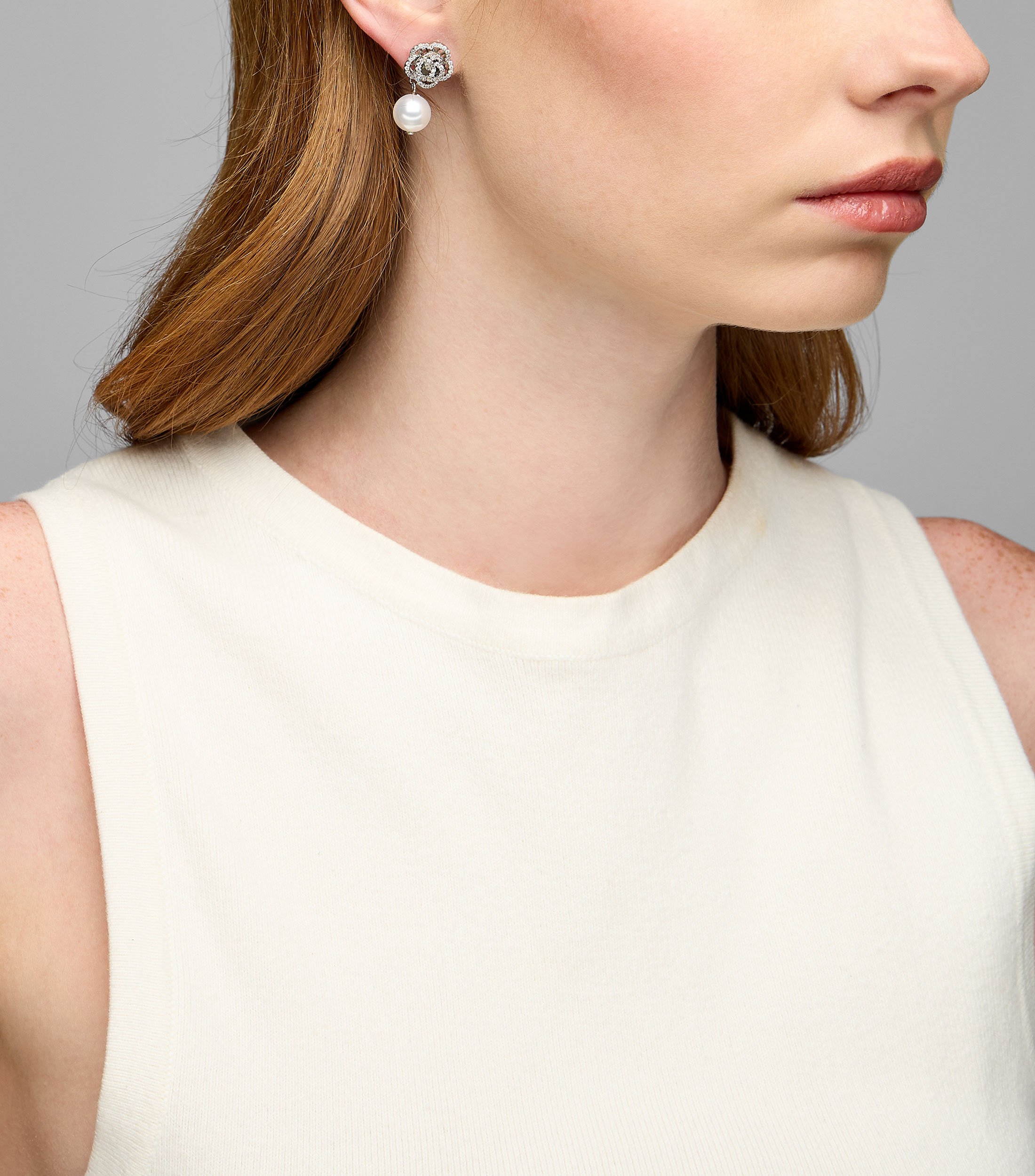 Aretes rosas con perla y cristal Mujer