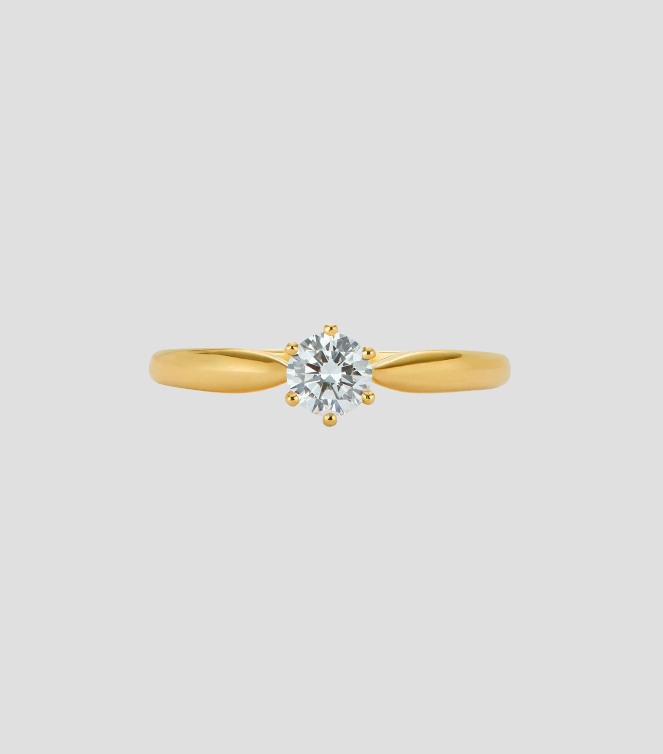 Anillo solitario en Oro amarillo de 18 Kilates con diamante Mujer