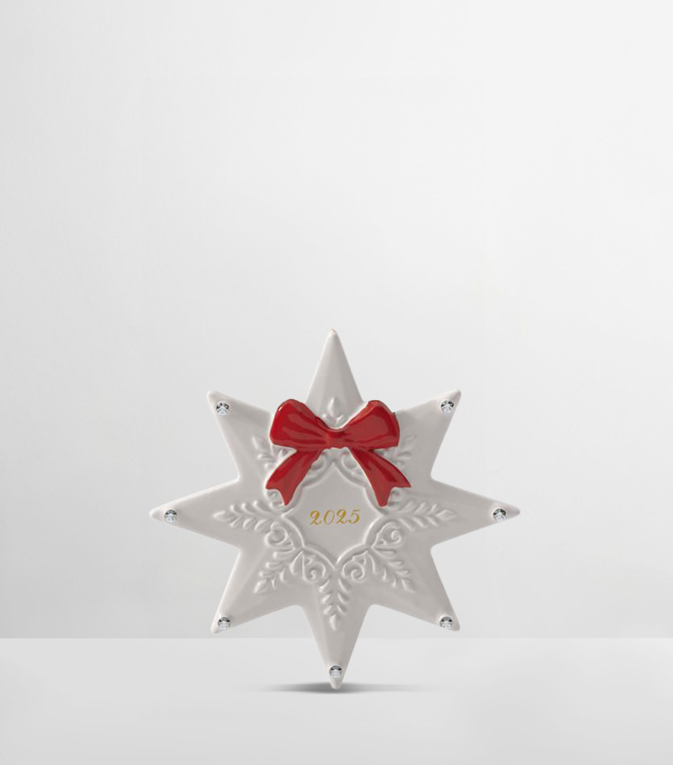 Ornamento navideño, Estrella 2025 Christmas Classics en porcelana
