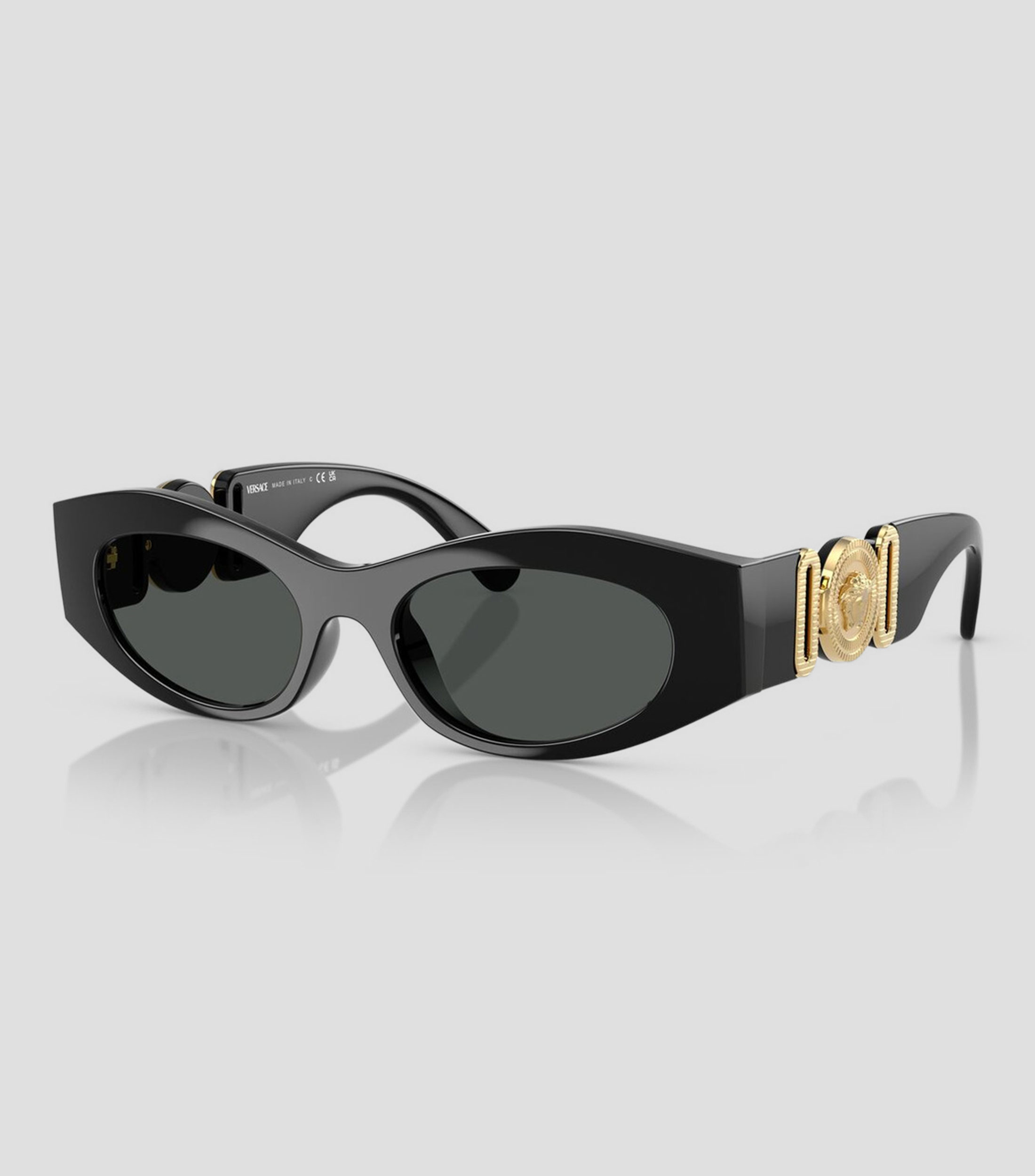 Lentes de sol ovalados negros Mujer