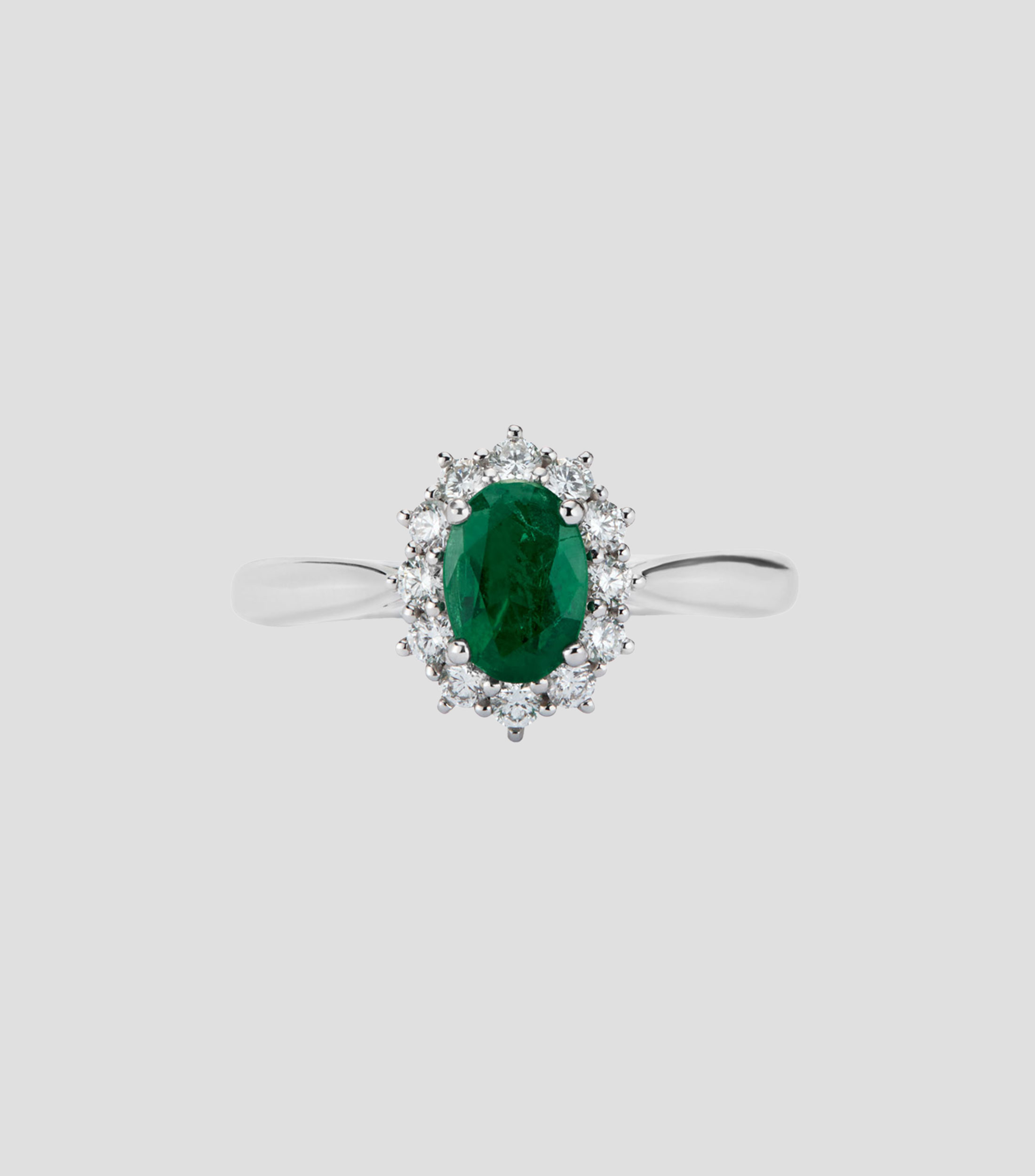 Anillo media alianza en Oro blanco de 18 Kilates con diamantes y esmeralda Mujer
