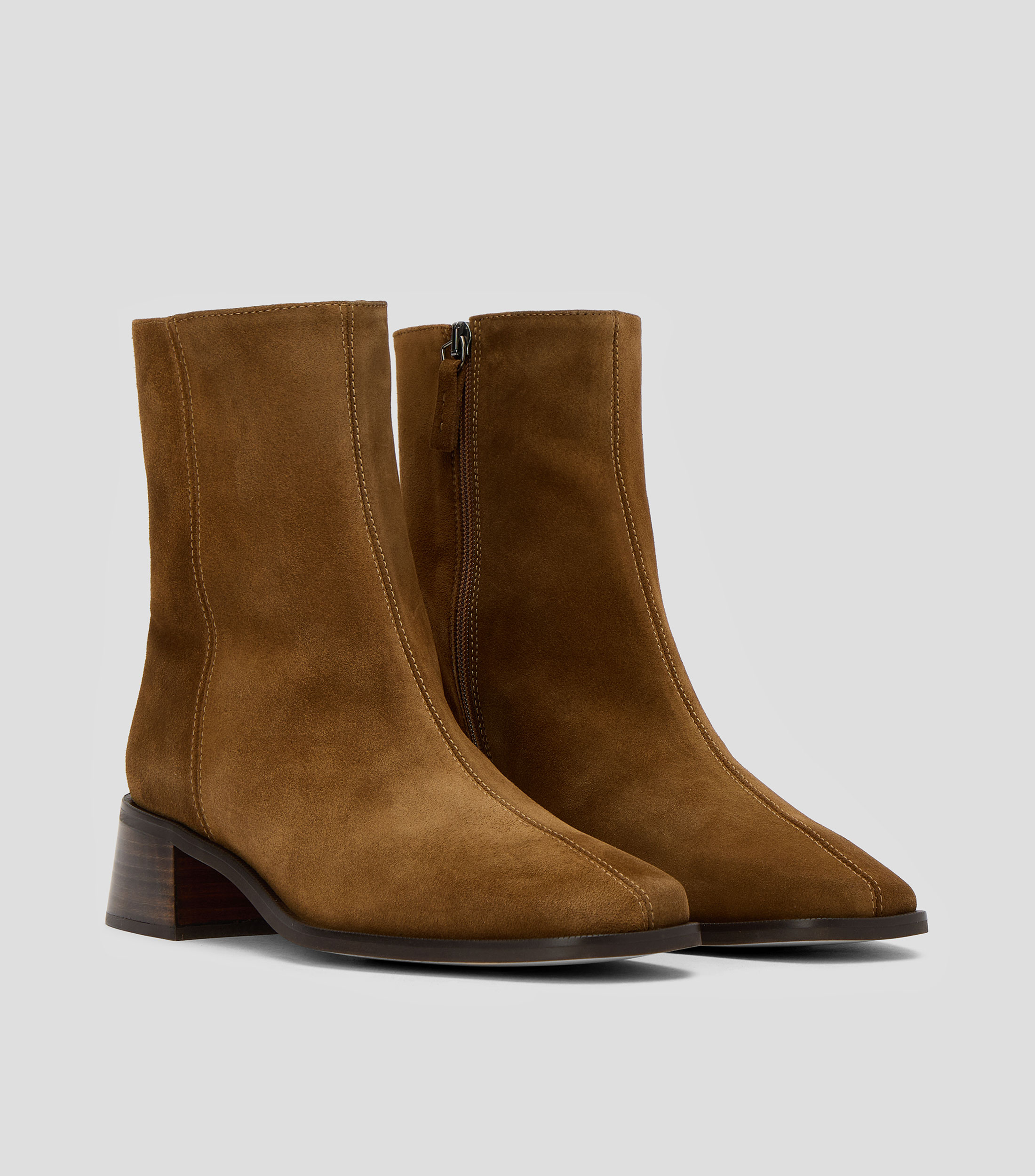 Botines casuales en piel con tacón medio y ancho Mujer