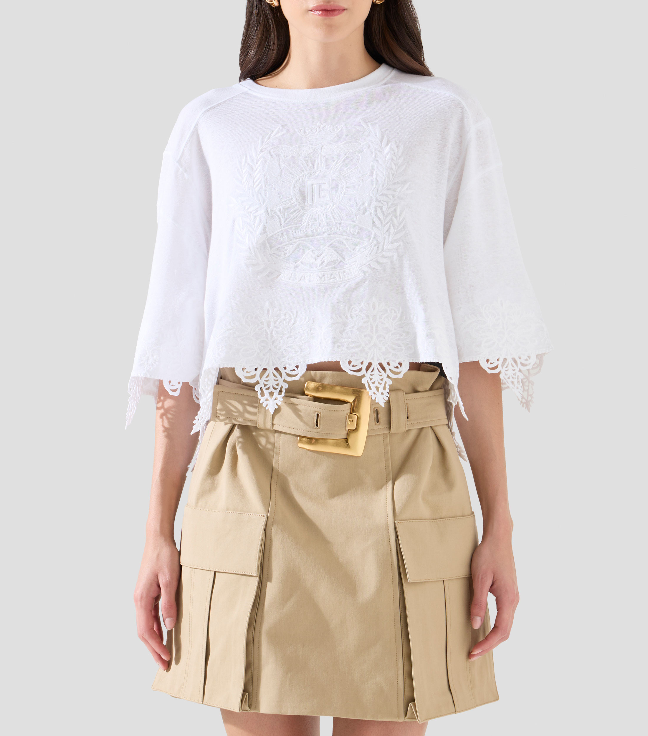 Blusa bordada con manga corta Mujer