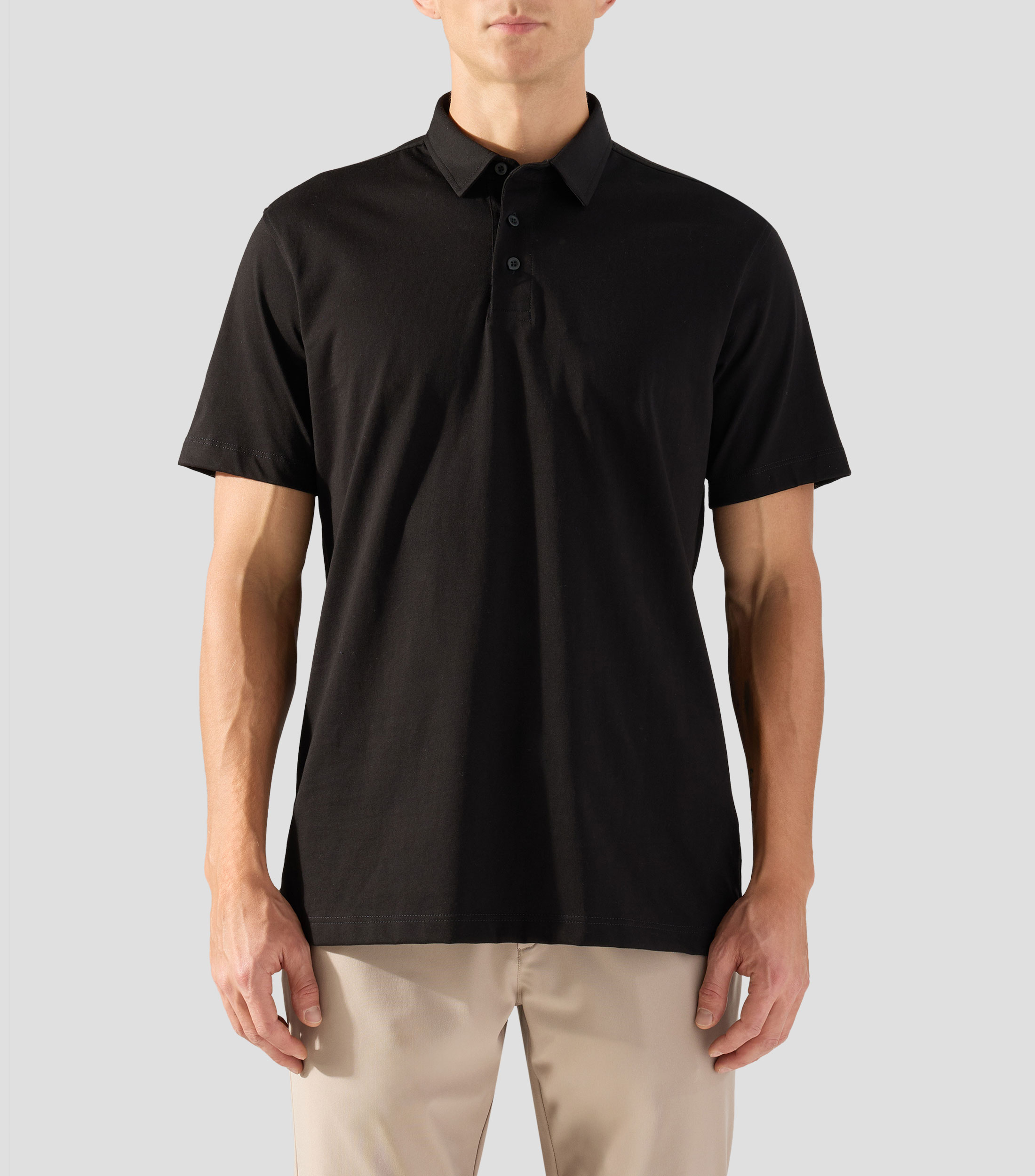 Playera tipo polo con manga corta lisa Hombre