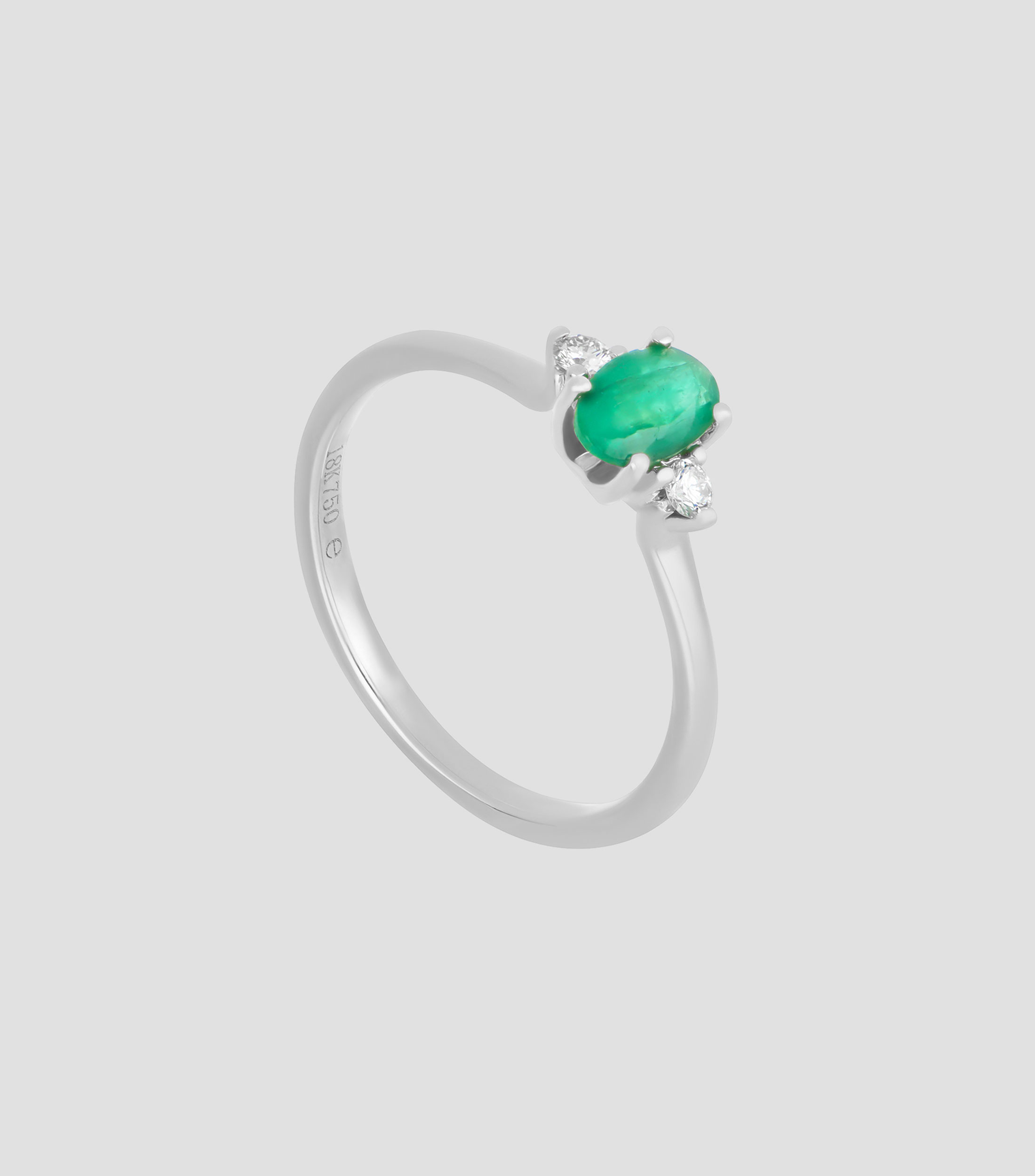 Anillo en oro blanco de 18 Kilates con esmeralda y diamantes Mujer