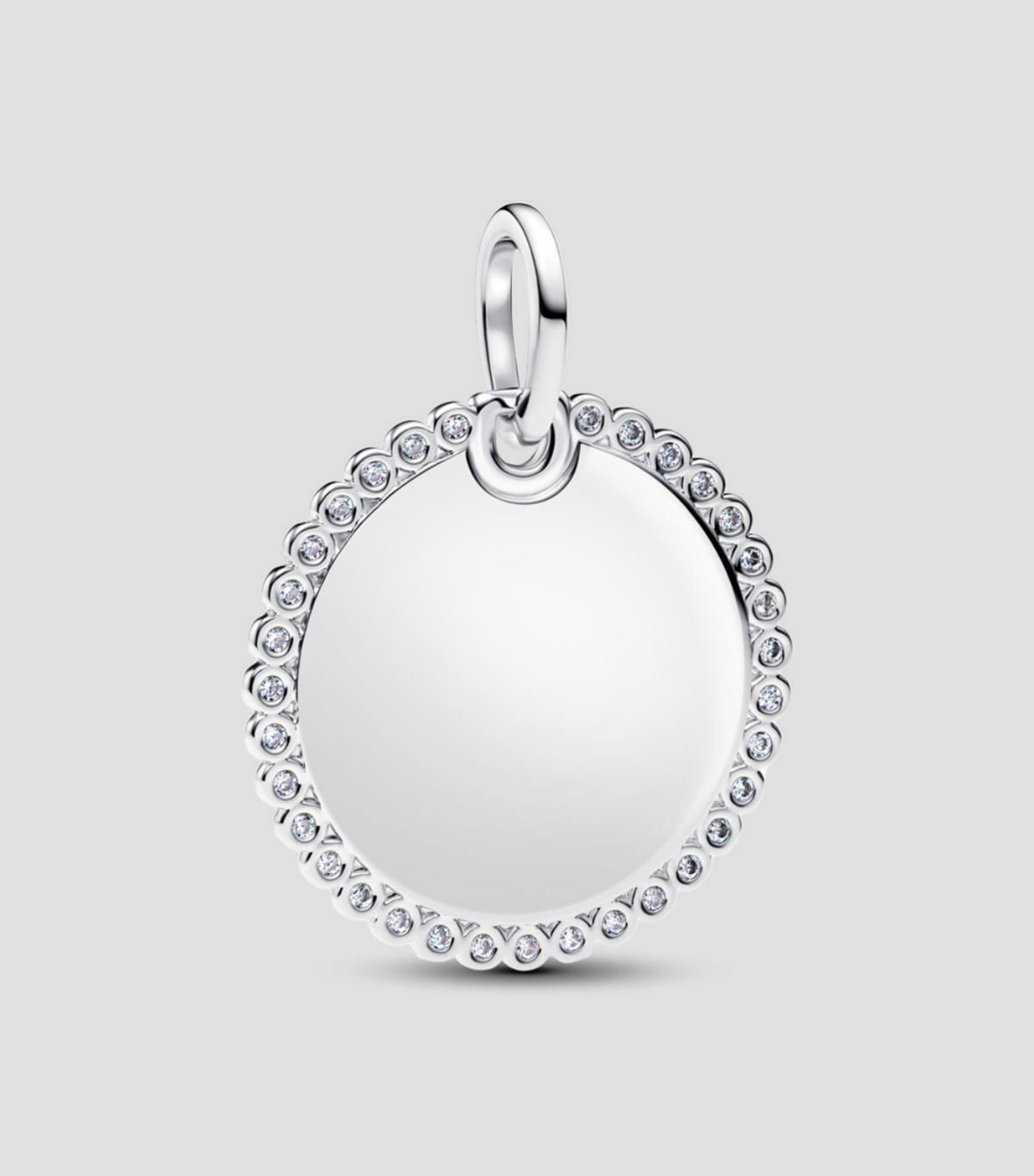 Dije redondo en plata Unisex