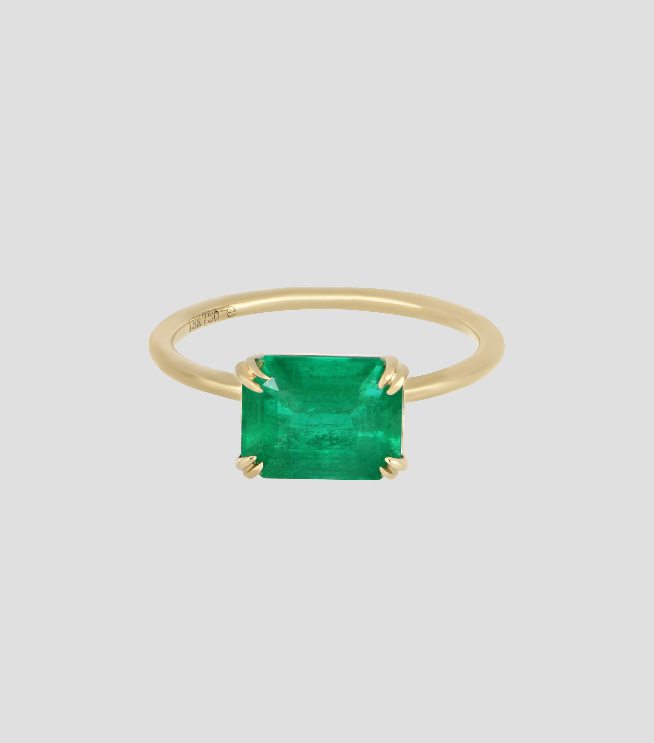 Anillo en oro amarillo de 18 kilates con esmeralda natural Mujer