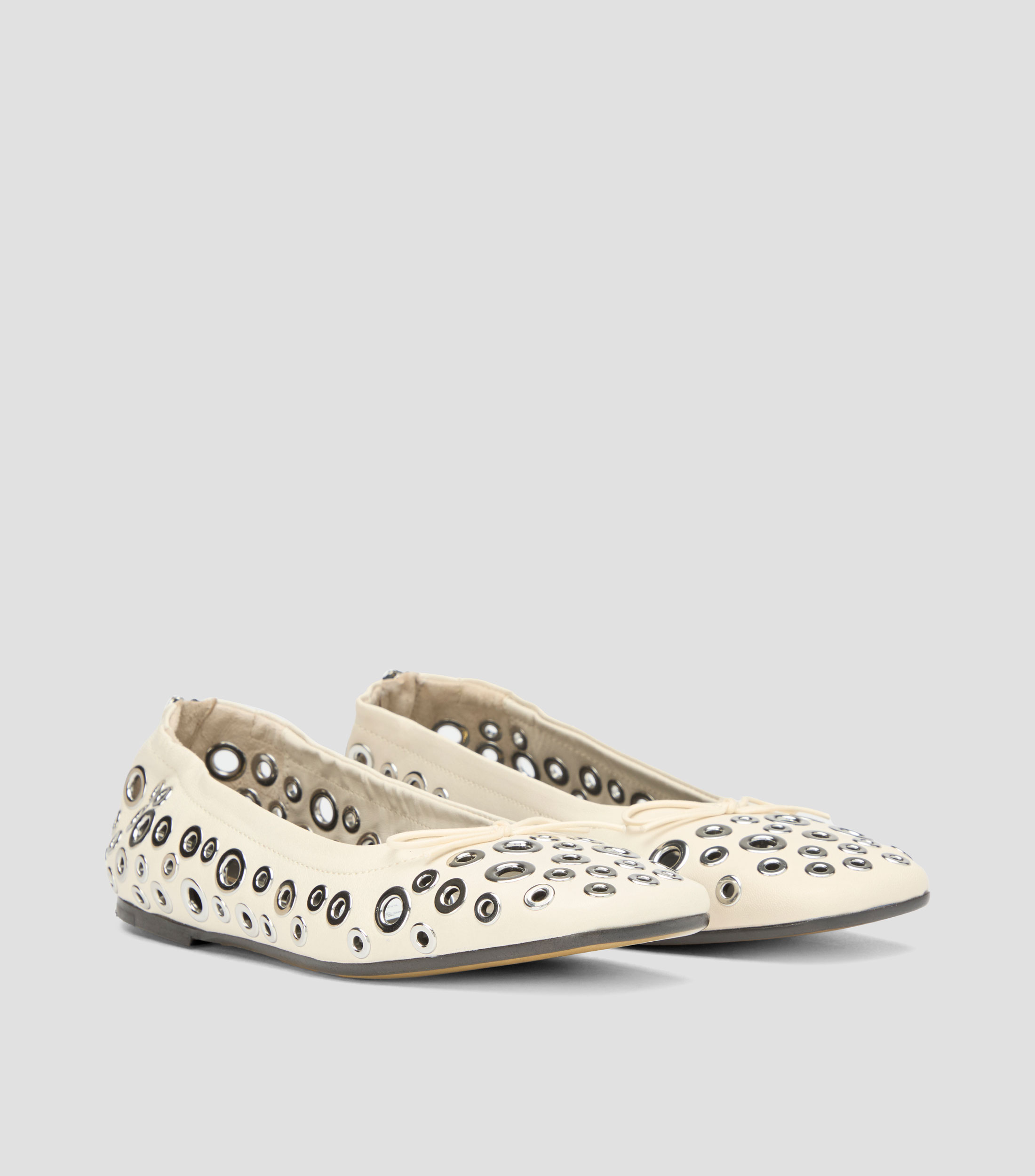 Flats con orificios en piel Mujer