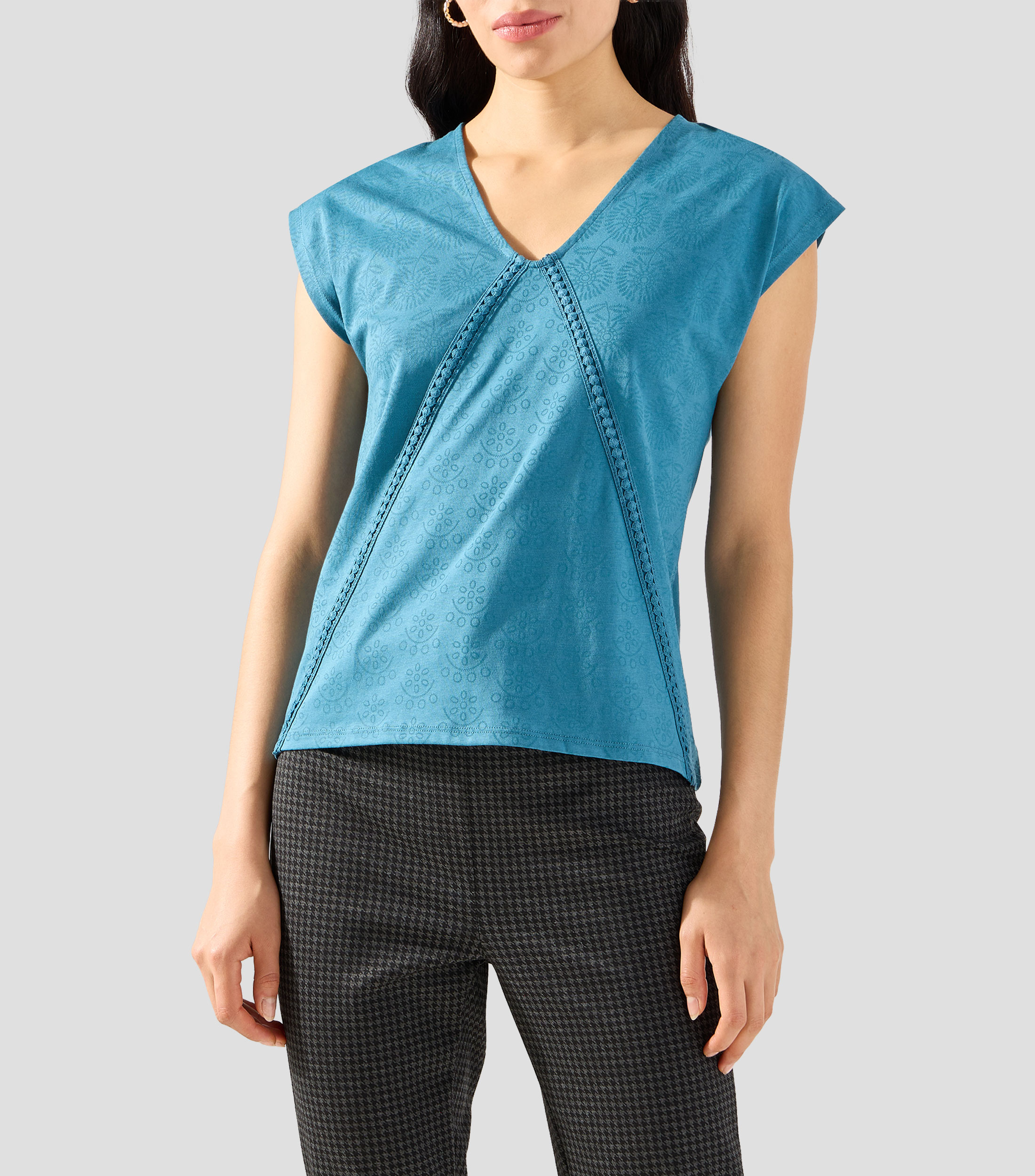 Playera cuello V sin mangas estampada Mujer