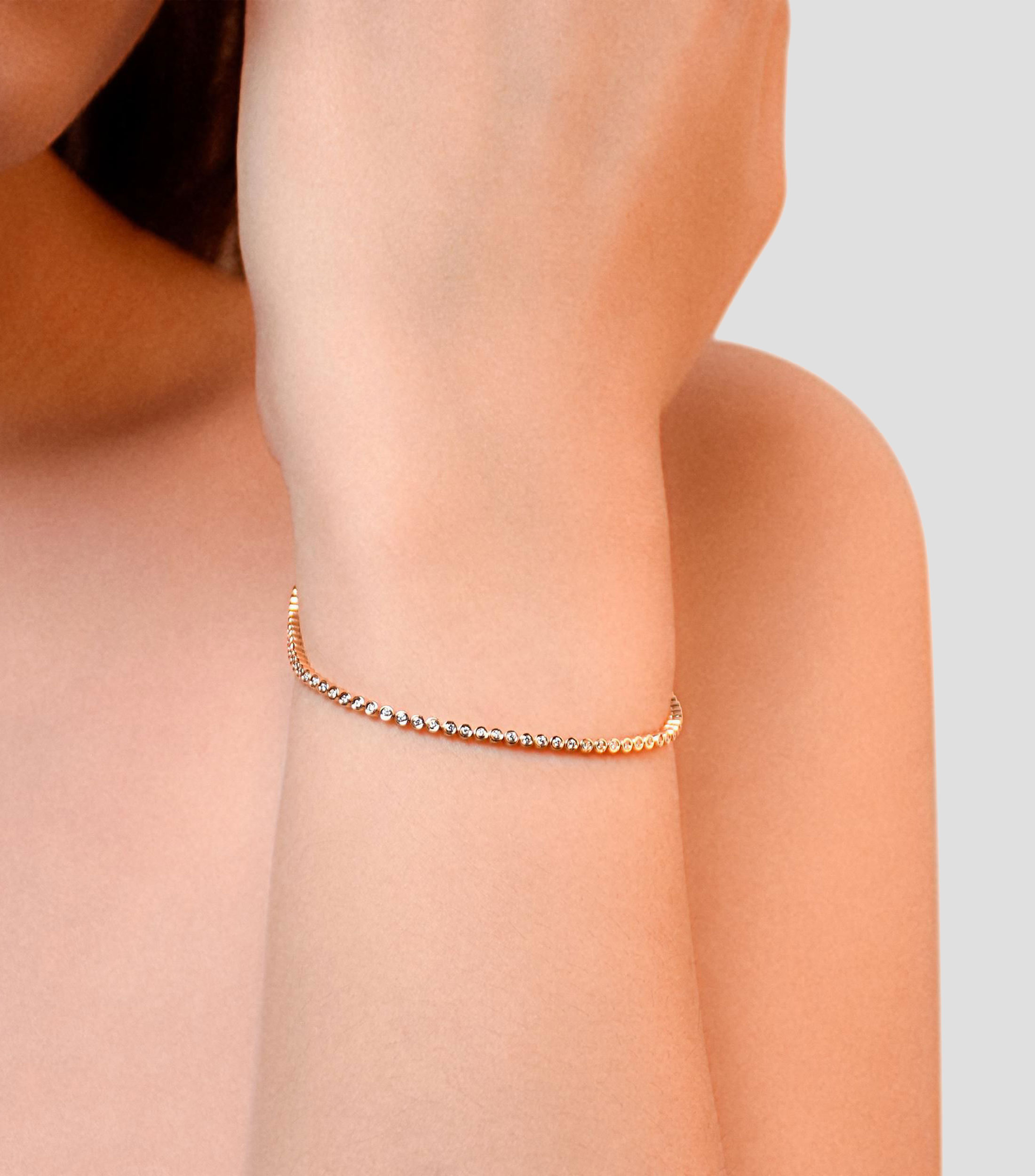 Pulsera en oro amarillo de 14 kilates con diamante Mujer