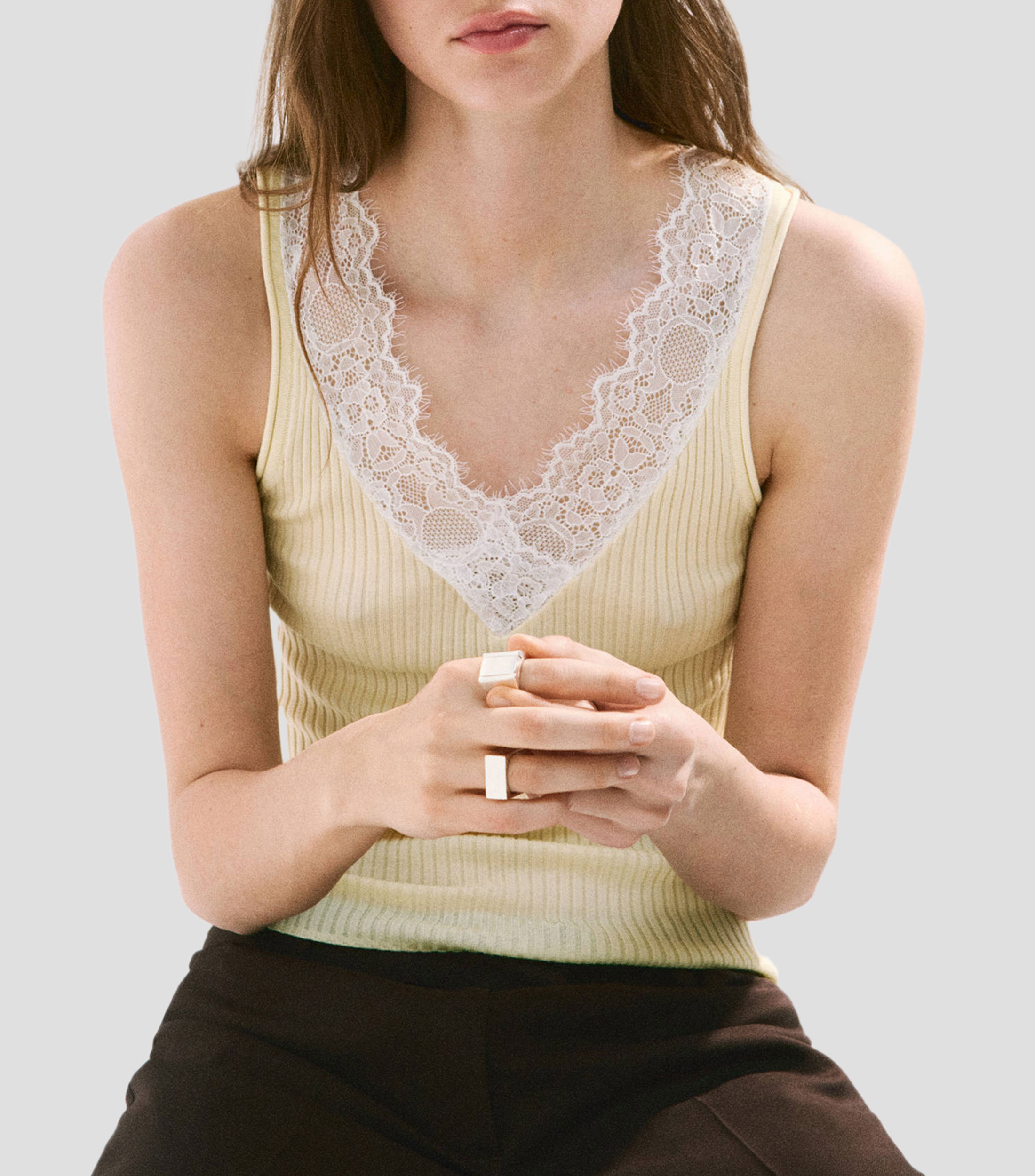 Top cuello V sin mangas fantasía Mujer