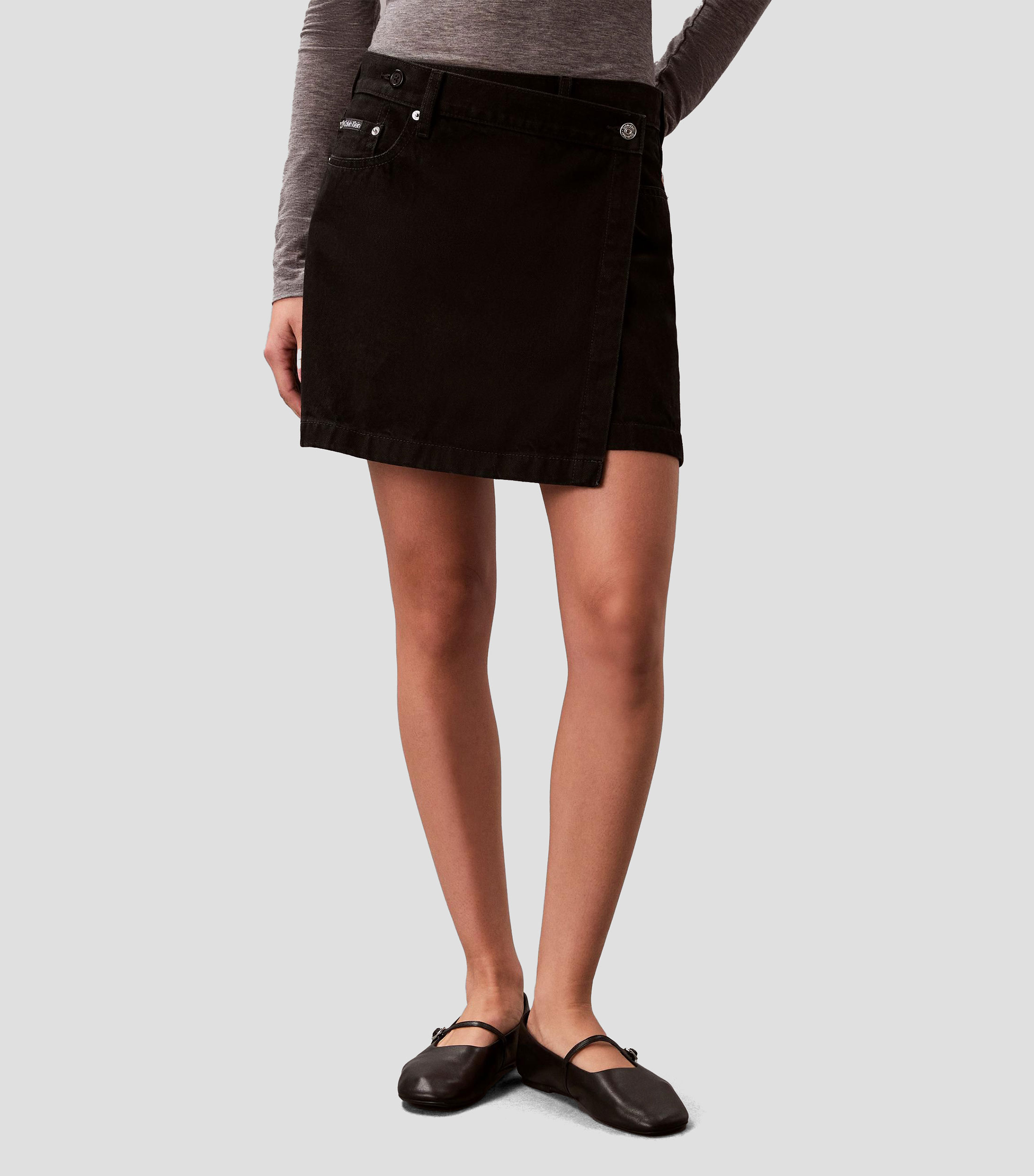 Falda mini de corte regular lisa en mezclilla Mujer