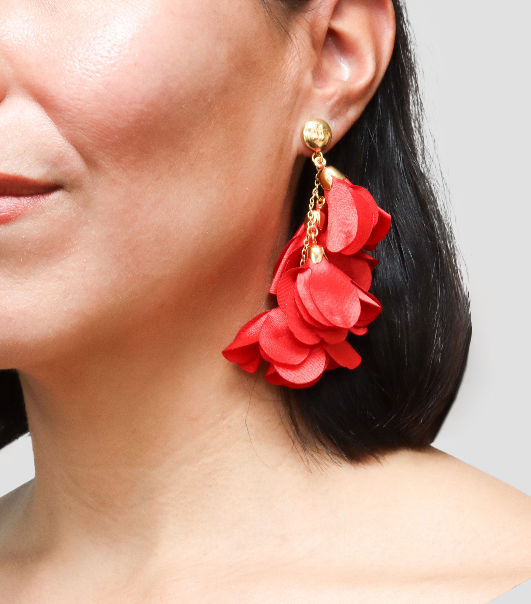 Aretes alargados de flores Mujer