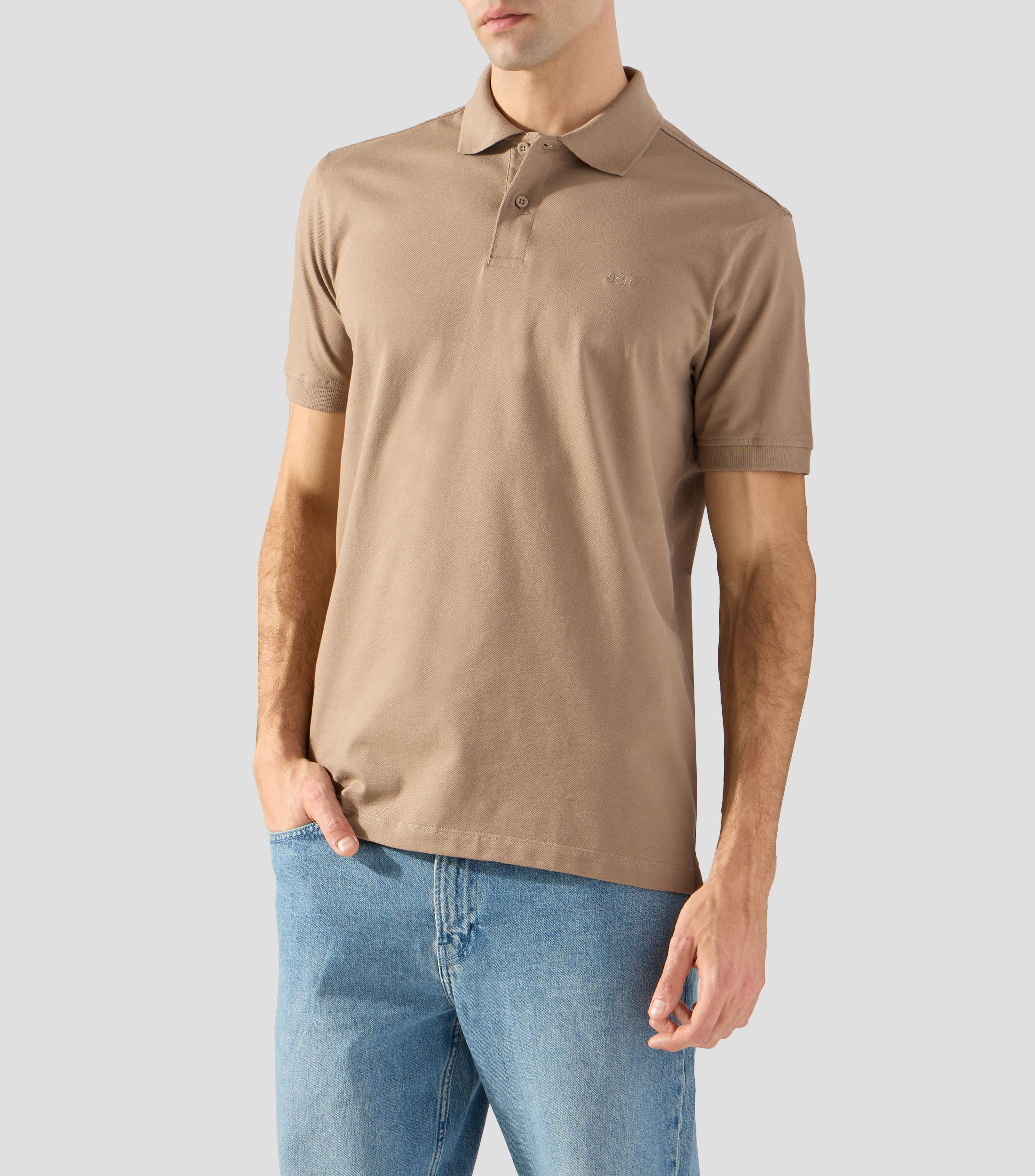 Playera tipo polo con manga corta lisa Hombre