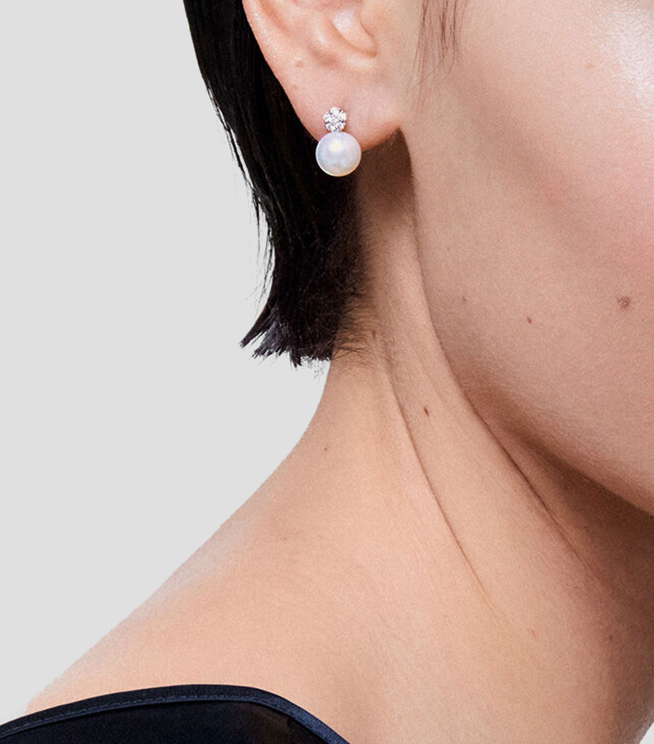 Aretes en oro blanco de 18 kilates con perla y diamante Mujer