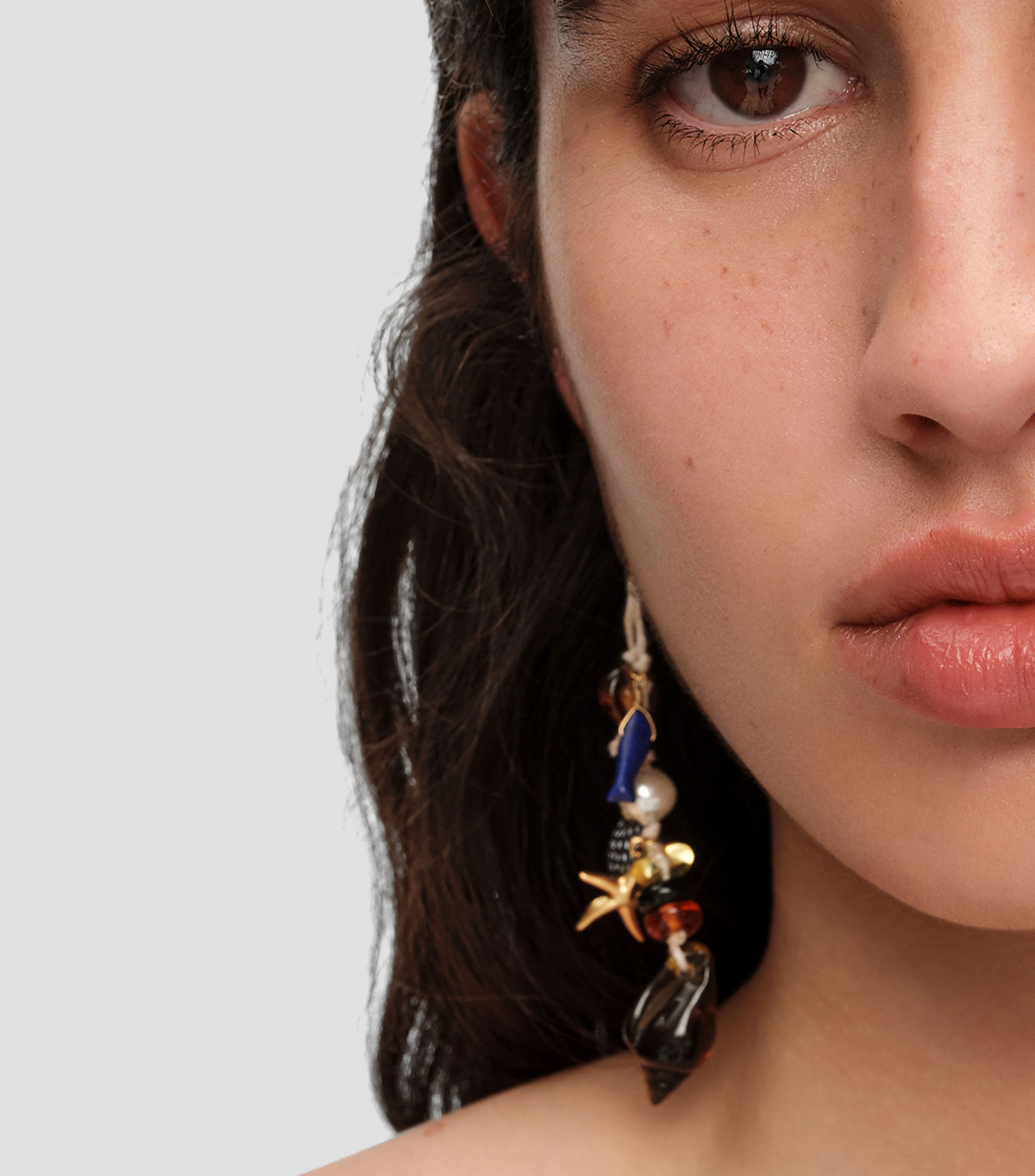 Pendientes estrellas y caracolas Mujer