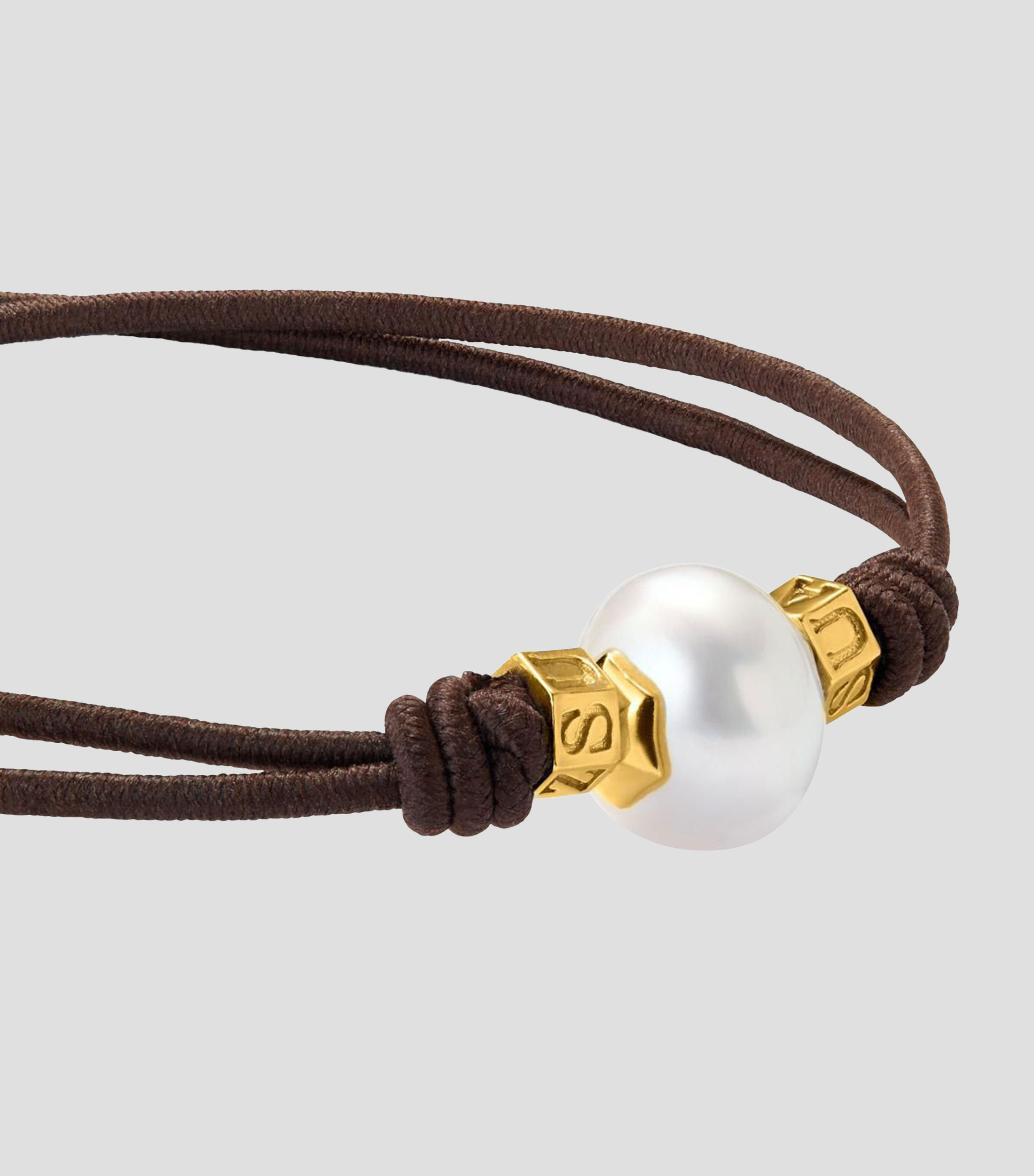 Pulsera One con perla australiana y detalles de Oro amarillo de 18 Kilates Mujer