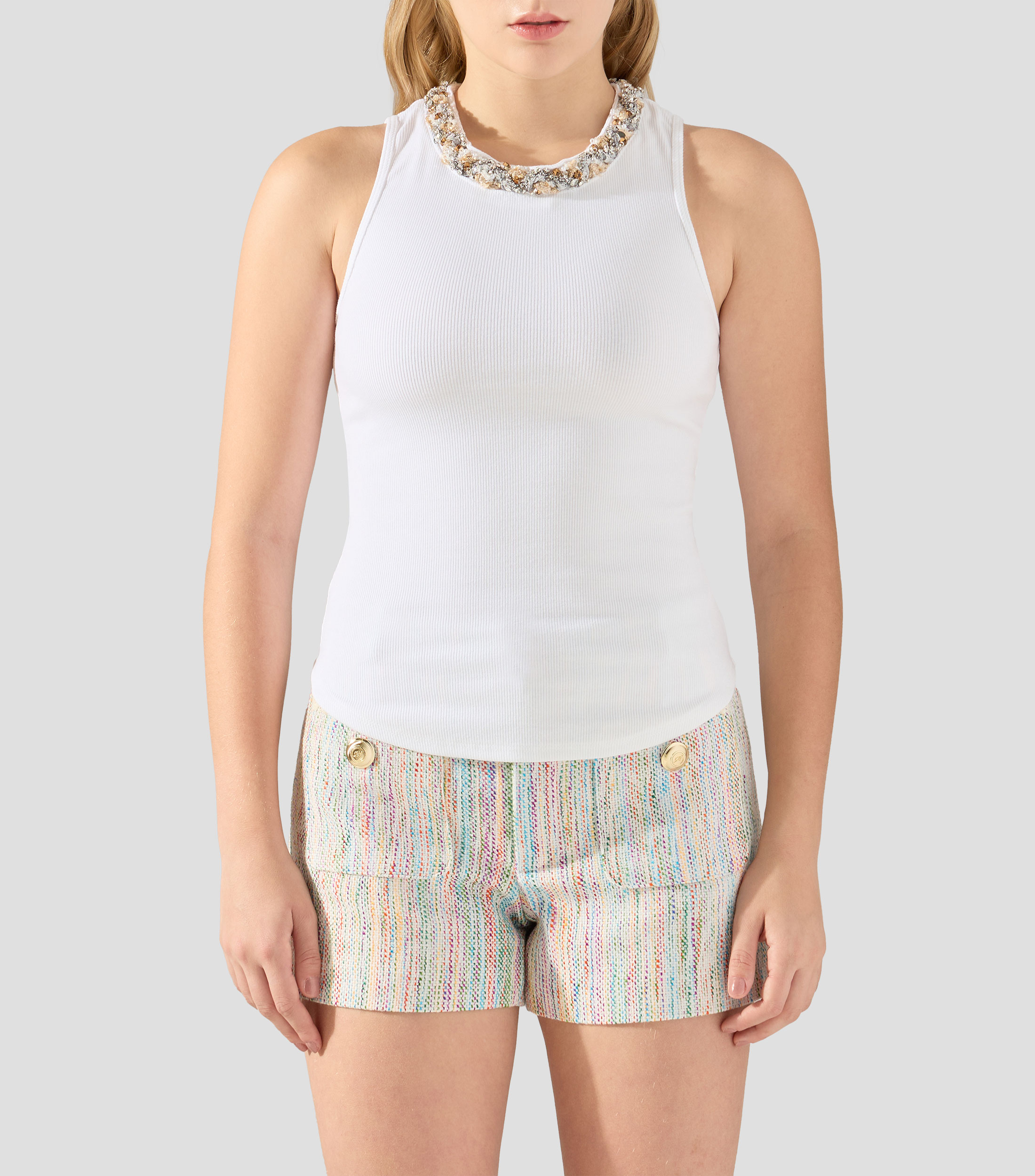 Playera cuello redondo sin mangas lisa Mujer