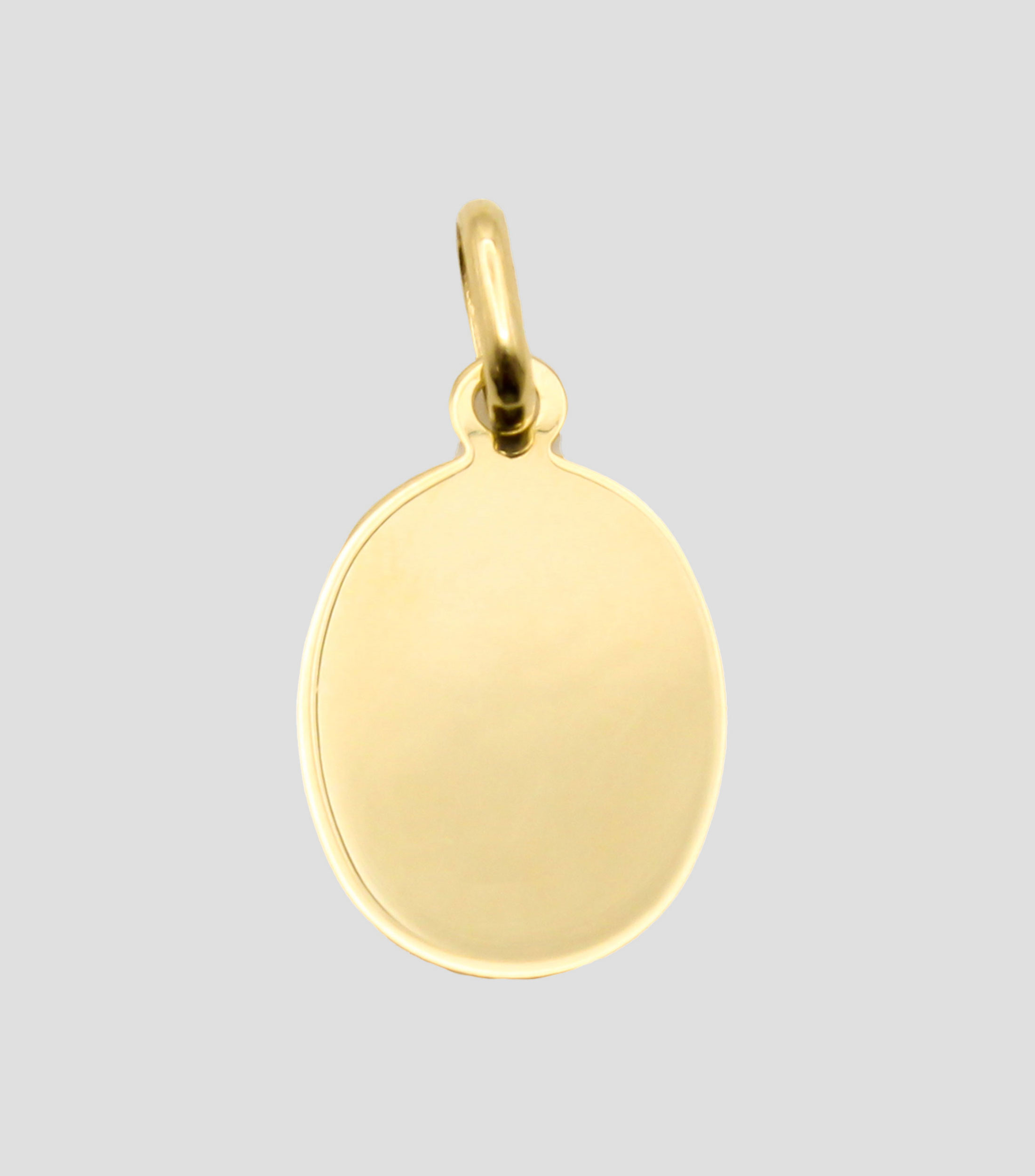 Medalla en oro amarillo 14 Kilates Sagrado Corazon Unisex