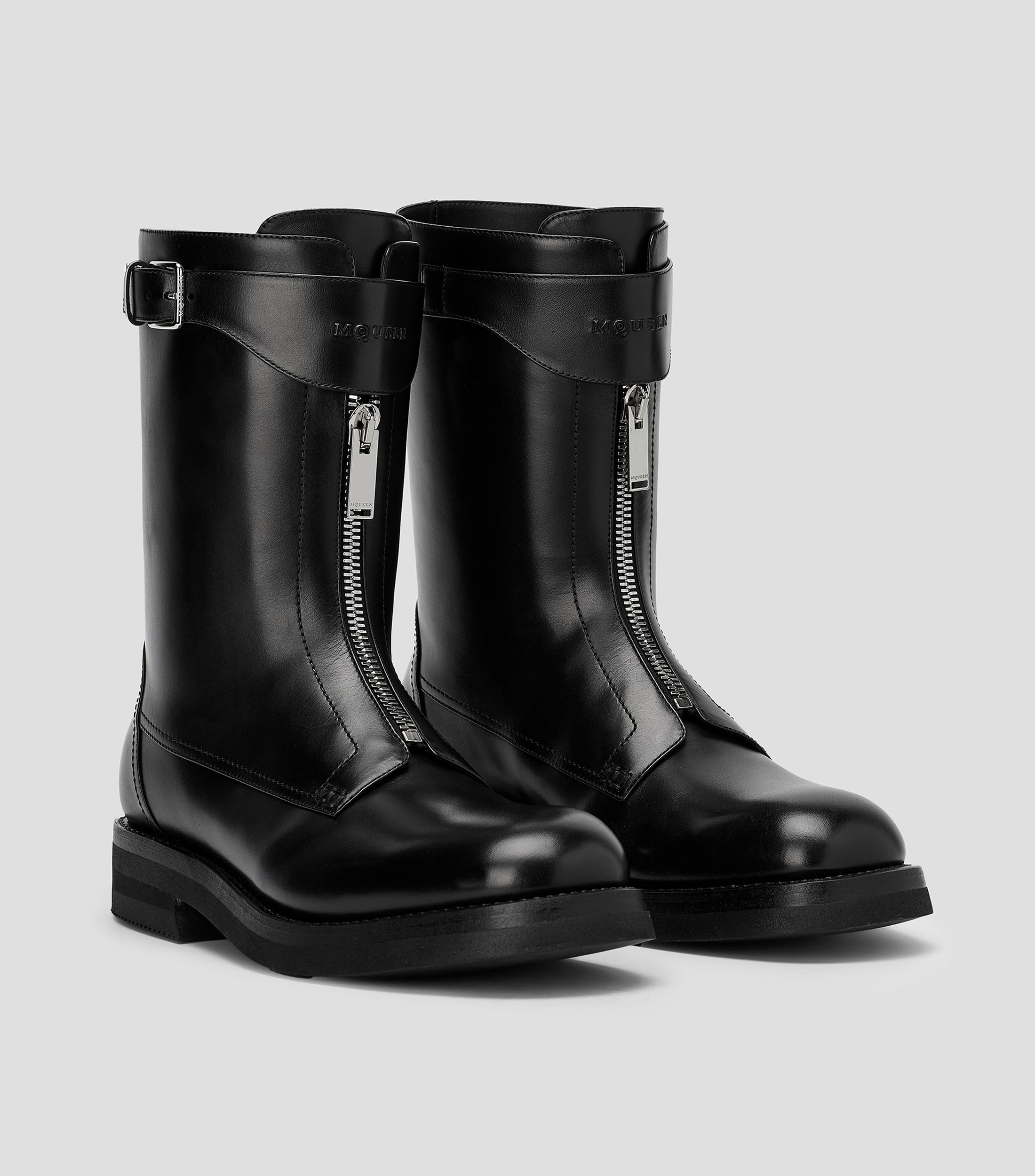 Botas en piel con tacón bajo media luna Hombre