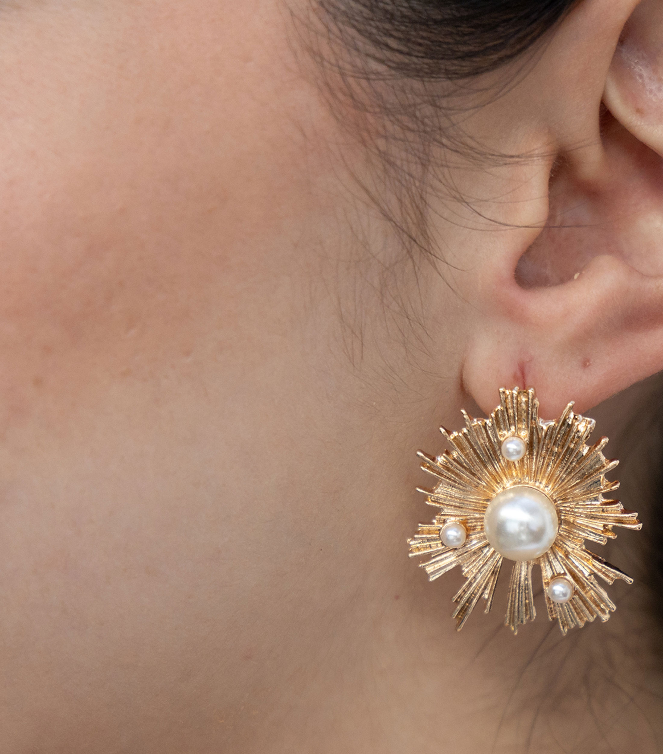 Aretes en forma de estrella con perla Mujer
