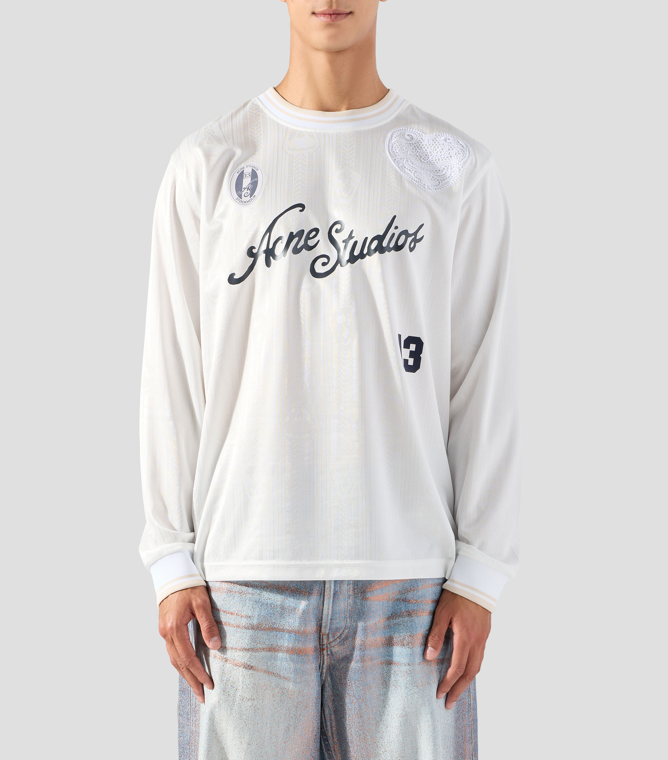 Playera de cuello redondo con manga larga estampada Hombre