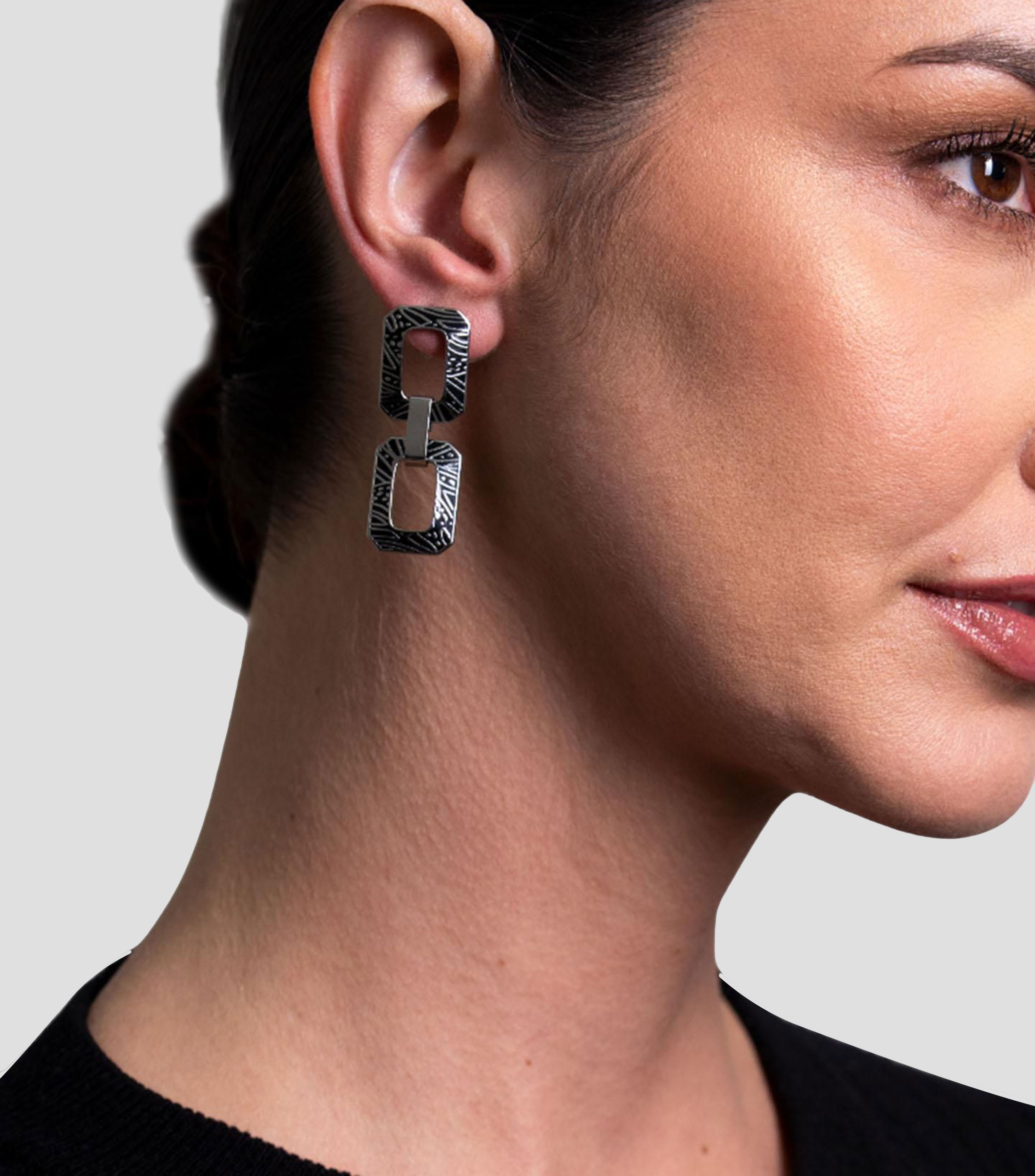 Aretes doble cuadro monarca Mujer