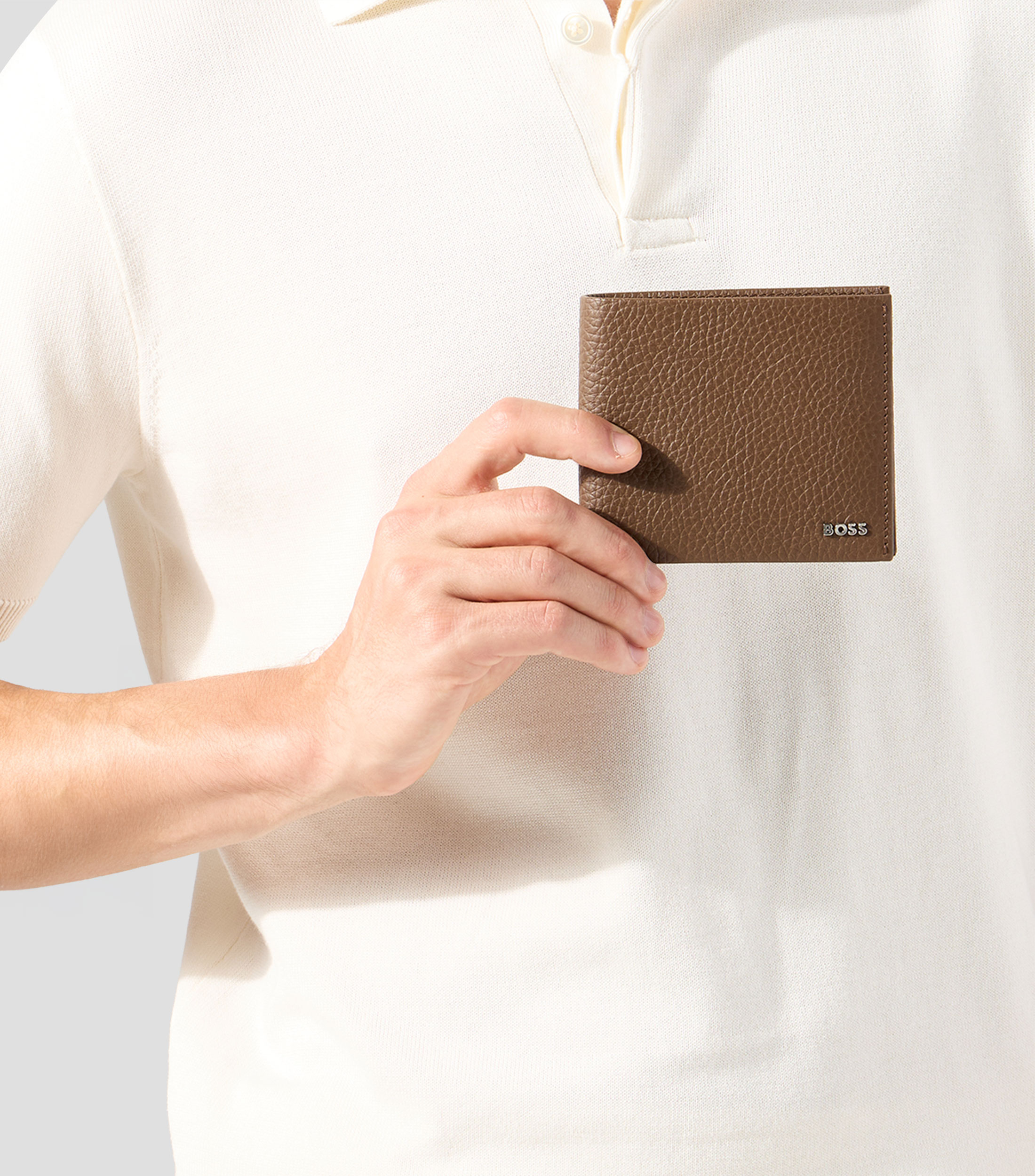 Cartera bifold New Crosstown en piel lisa Hombre
