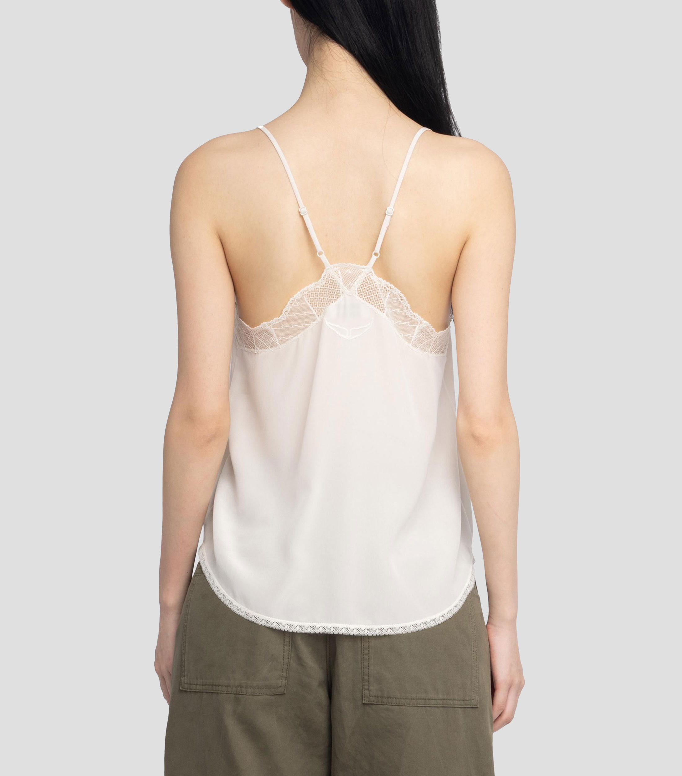 Blusa lisa sin mangas Mujer