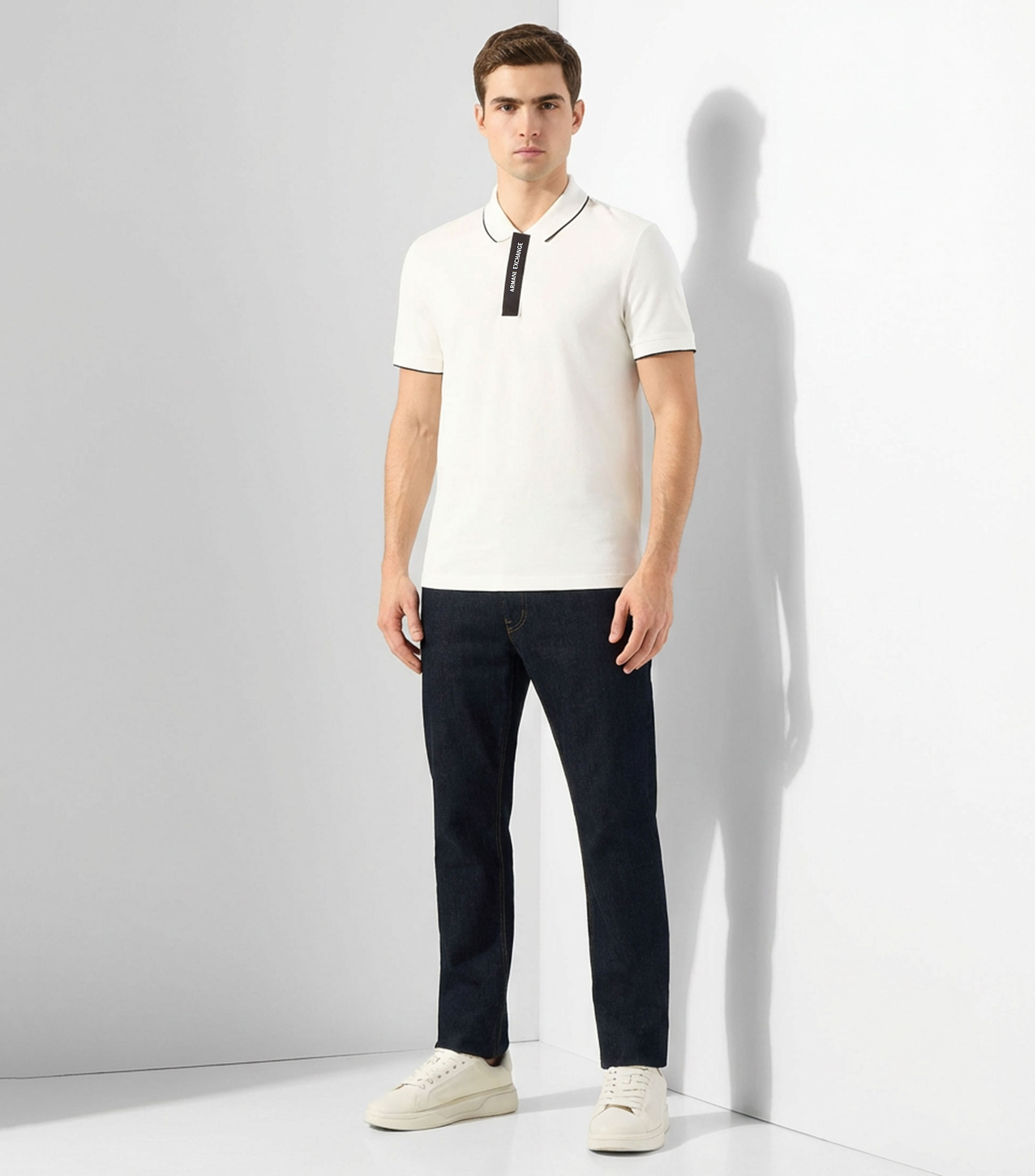 Playera tipo polo con manga corta lisa Hombre