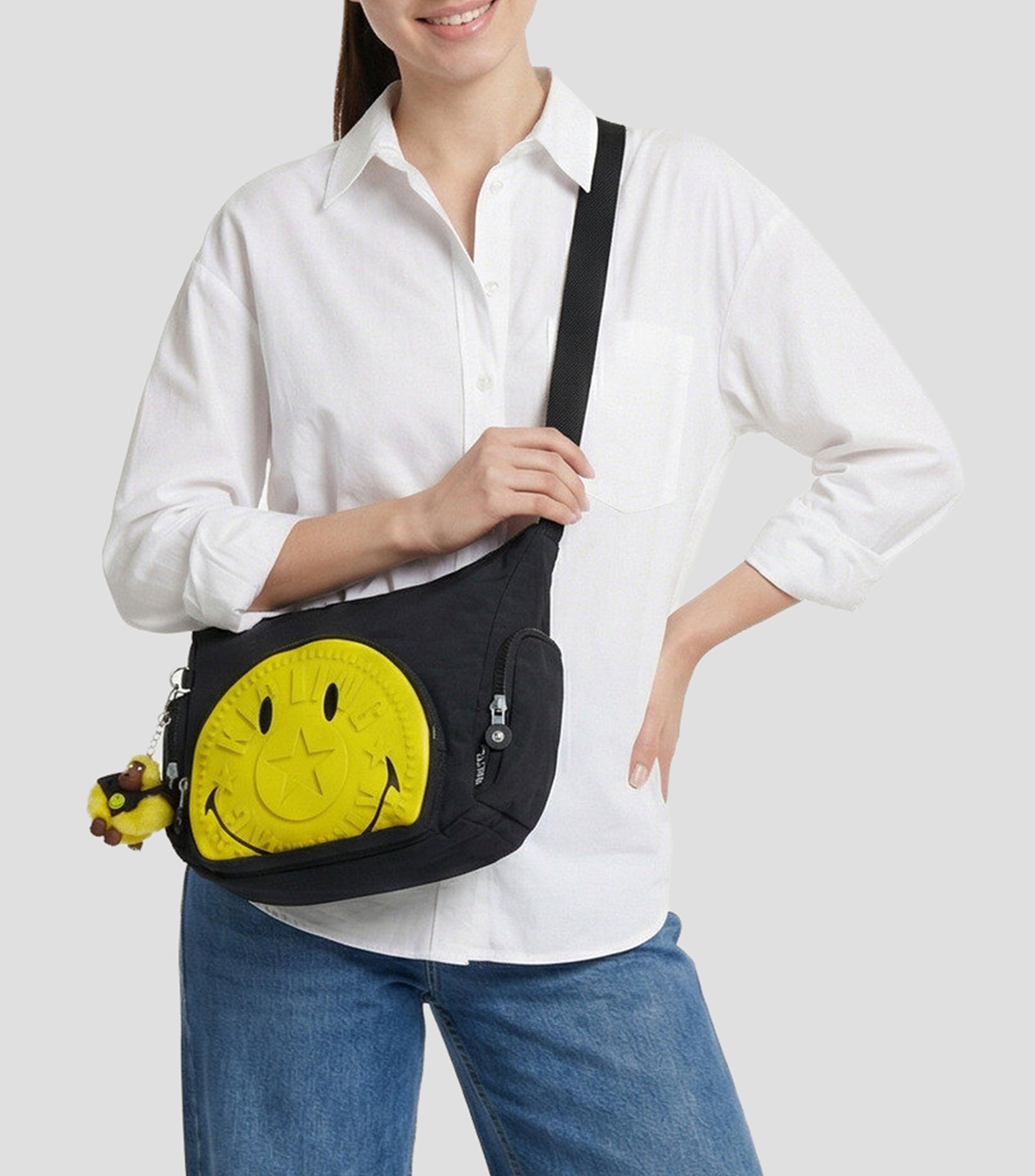 Bolsa shoulder negro y amarillo estampada Niña