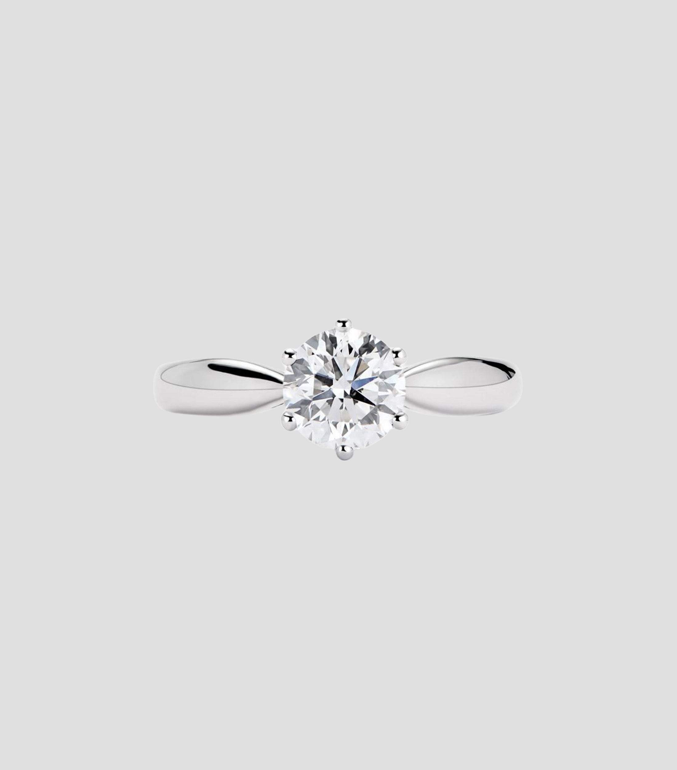 Anillo solitario en Oro blanco de 18 Kilates con diamante Mujer