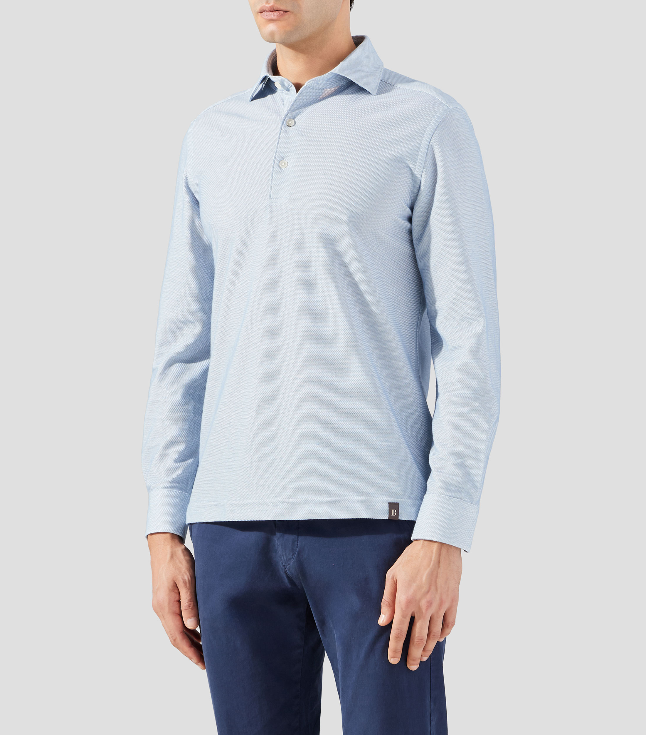 Playera tipo polo manga larga jaspeada Hombre