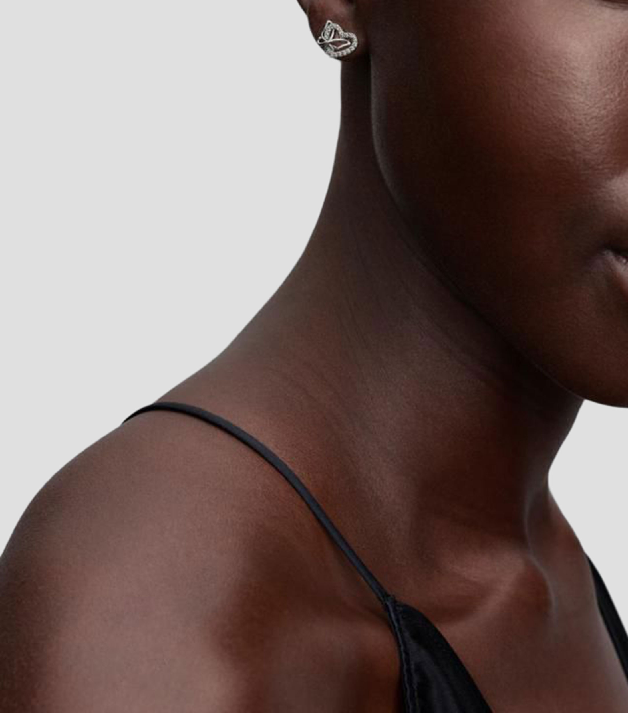 Aretes en plata esterlina corazón con mariposa Mujer