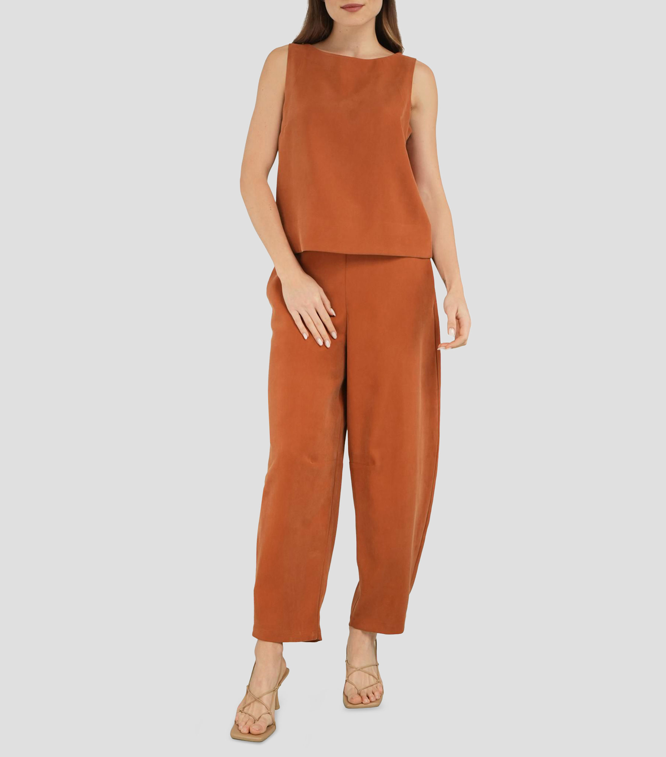 Blusa lisa sin mangas Mujer