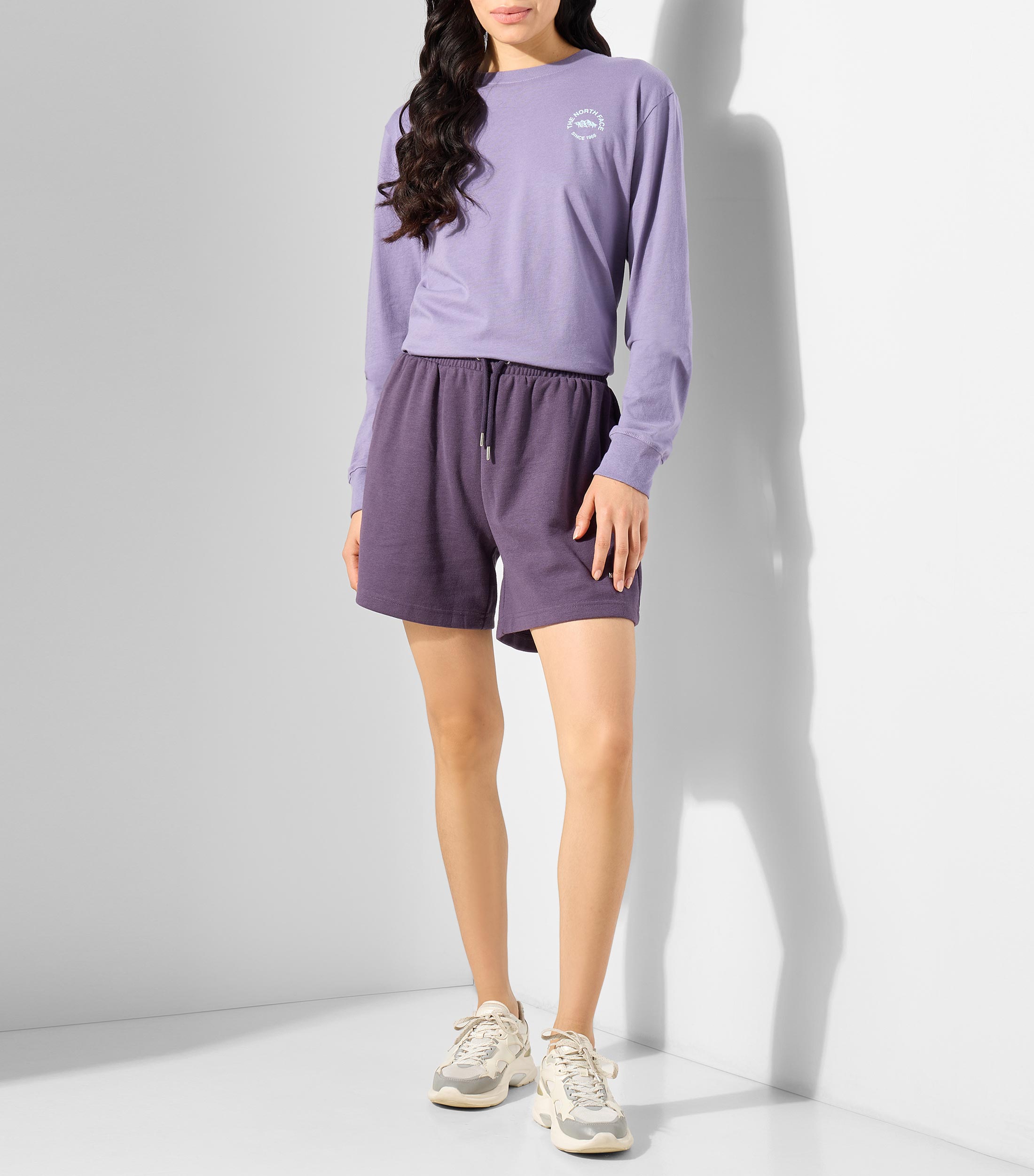 Playera cuello redondo manga larga estampada EVO TNF NSE Mujer