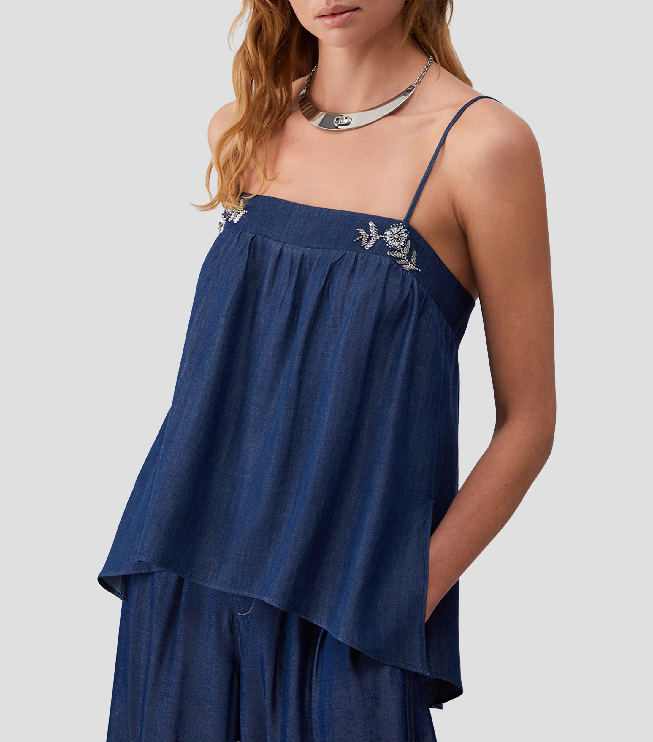 Blusa fantasía sin mangas Mujer