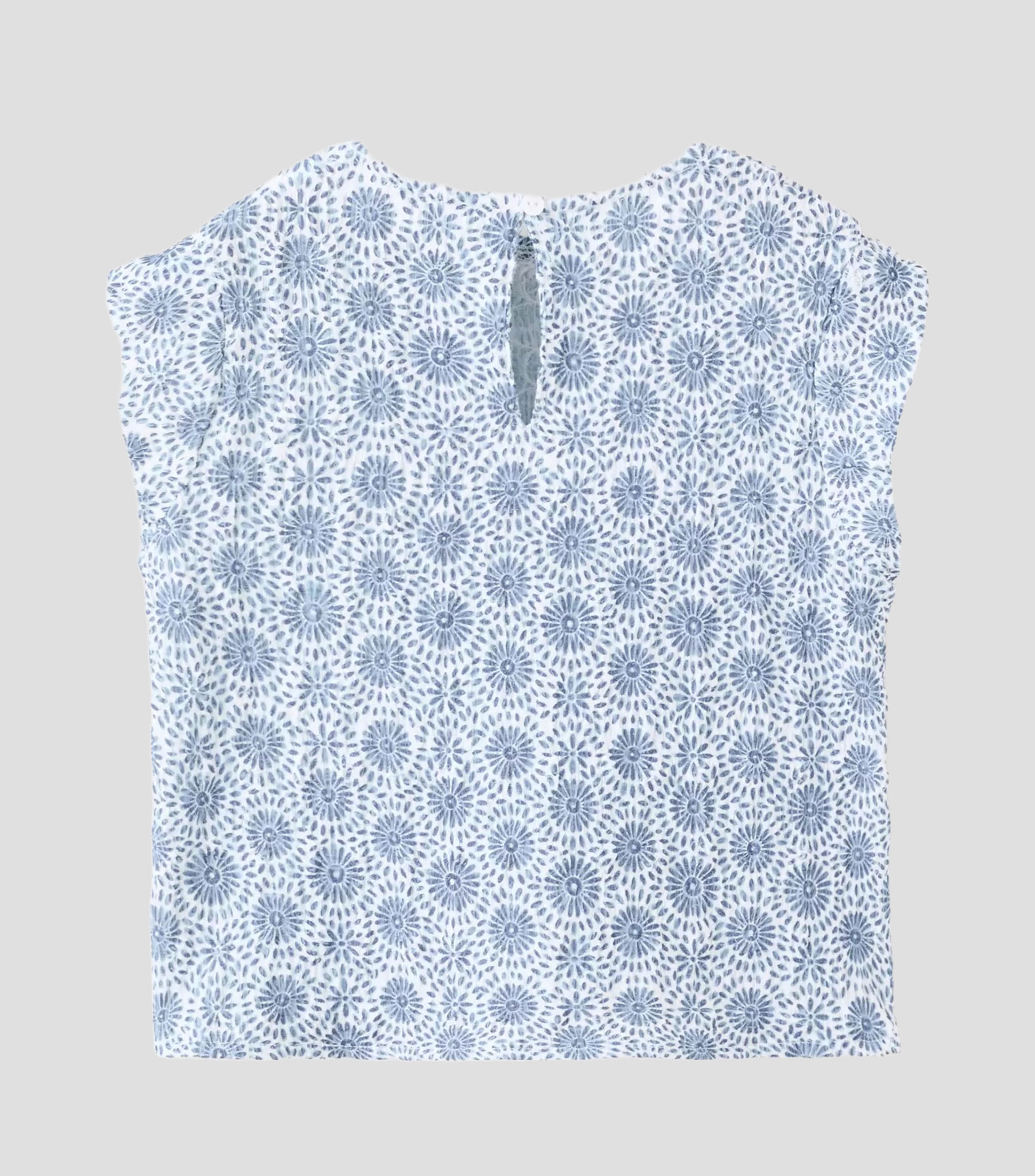 Playera cuello redondo sin mangas estampada Niña