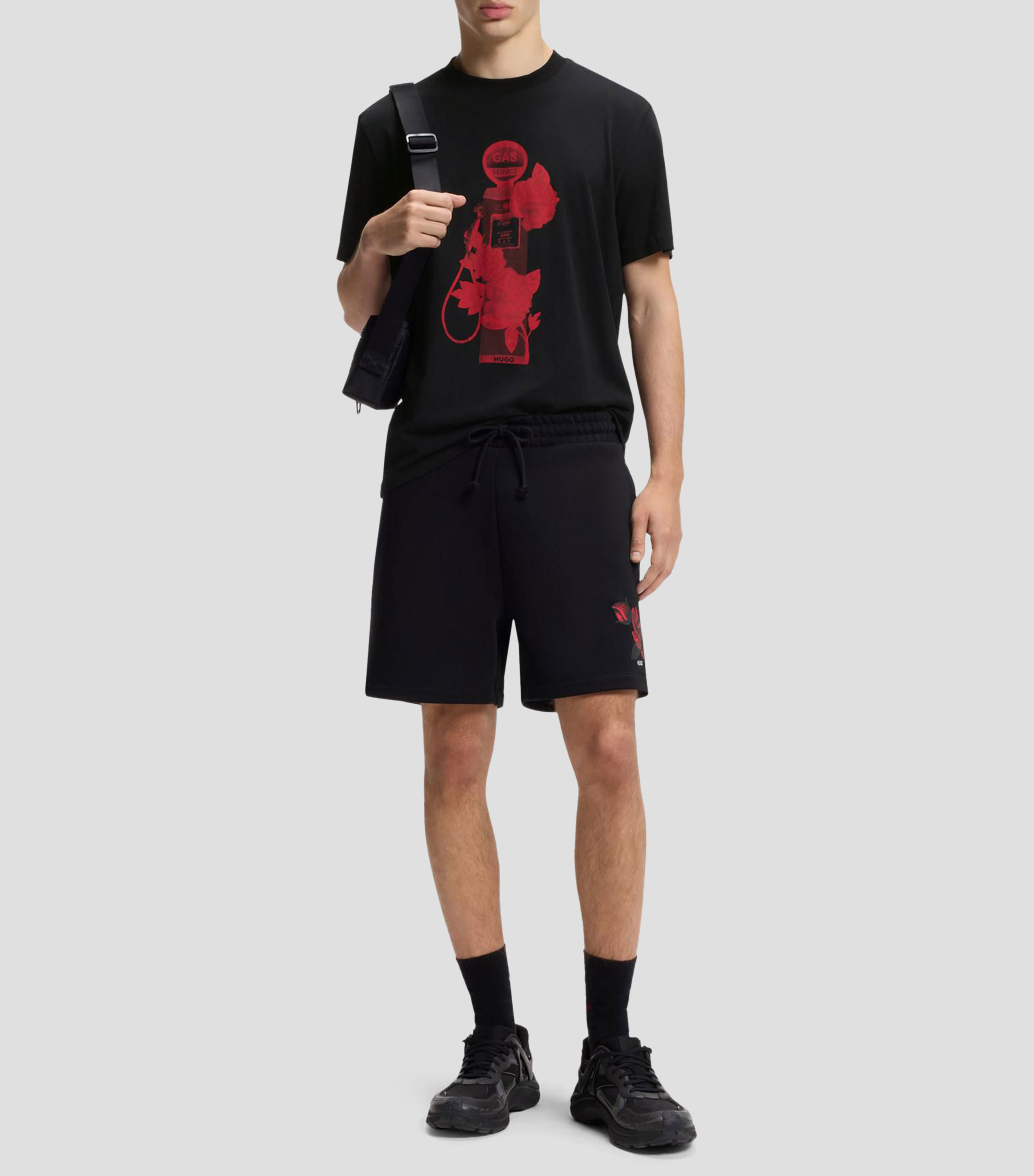 Playera de punto de algodón con gráficos de rosas e inspiración motera Hombre