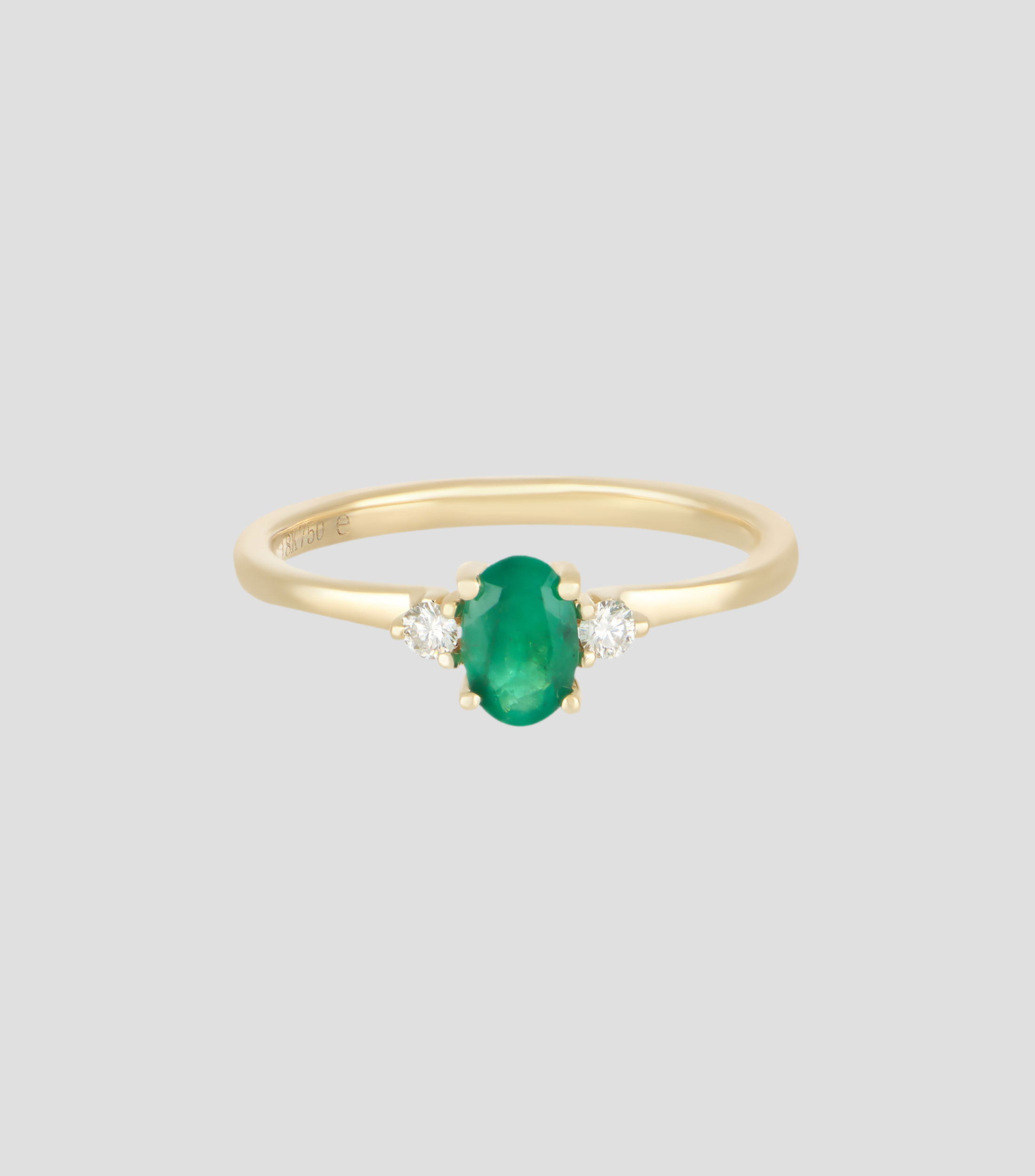 Anillo en oro amarillo de 18 Kilates con esmeralda y diamantes Mujer