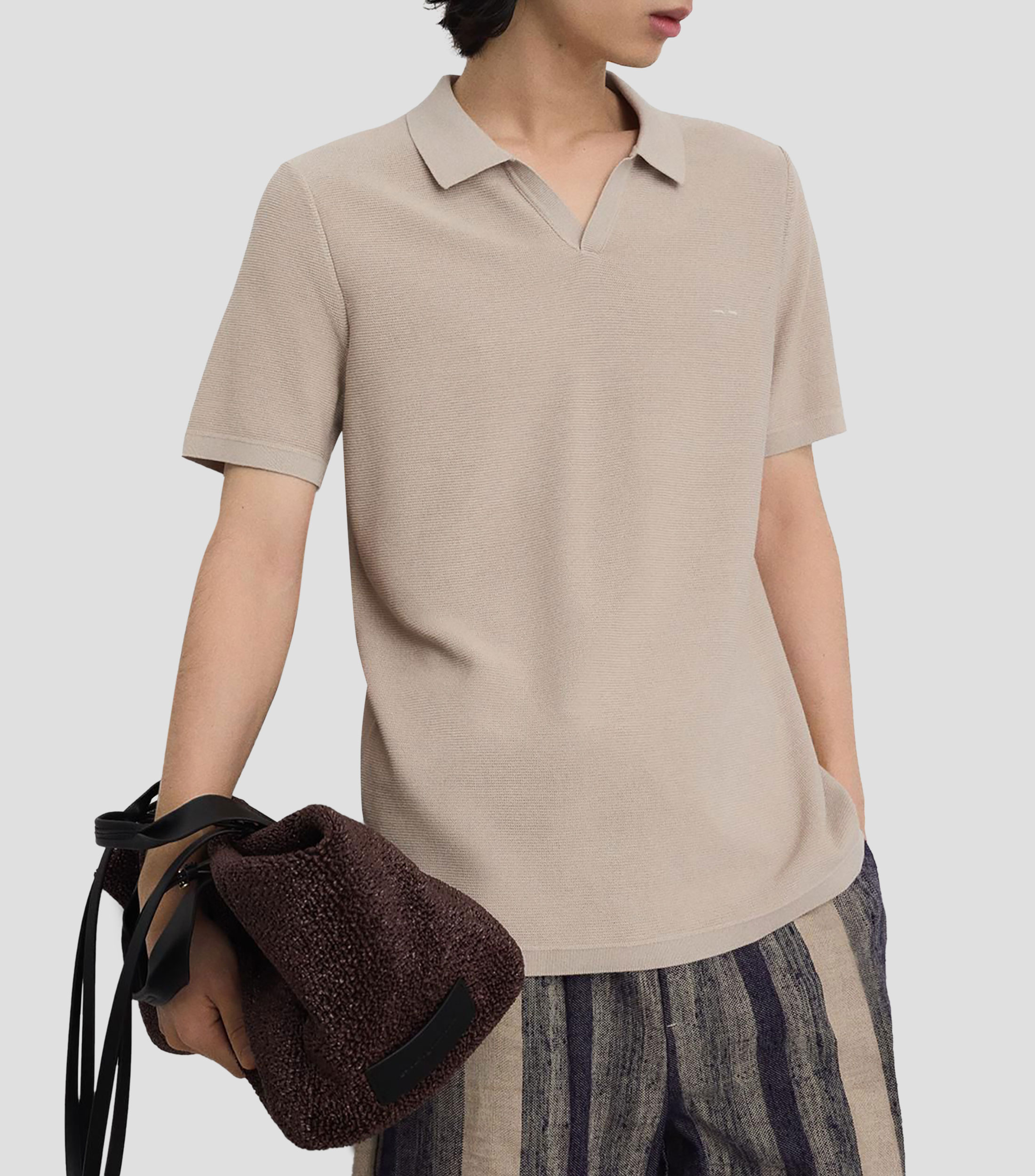 Playera tipo polo con manga corta lisa Hombre