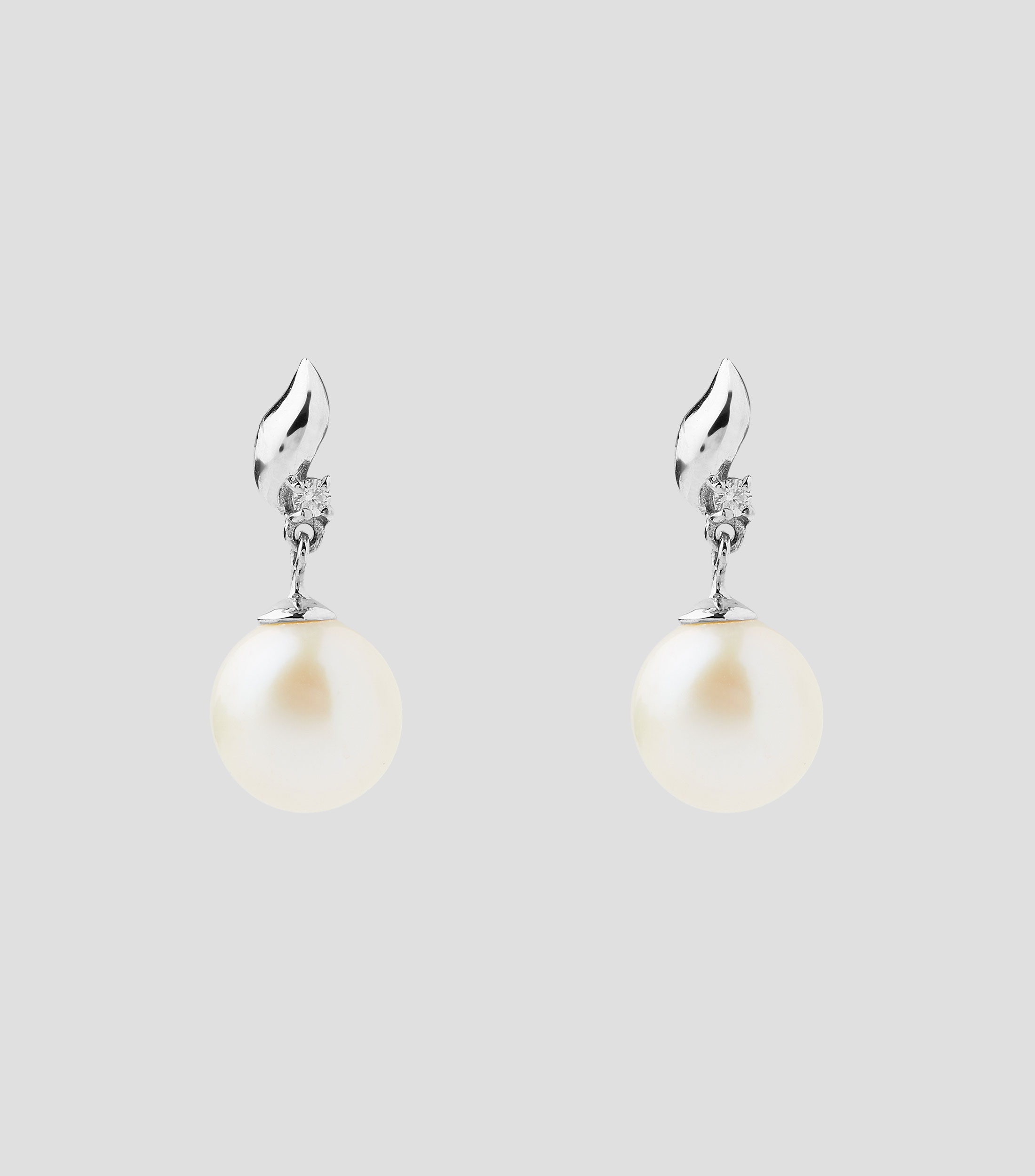 Aretes en Oro blanco de 18 Kilates con perla Mujer