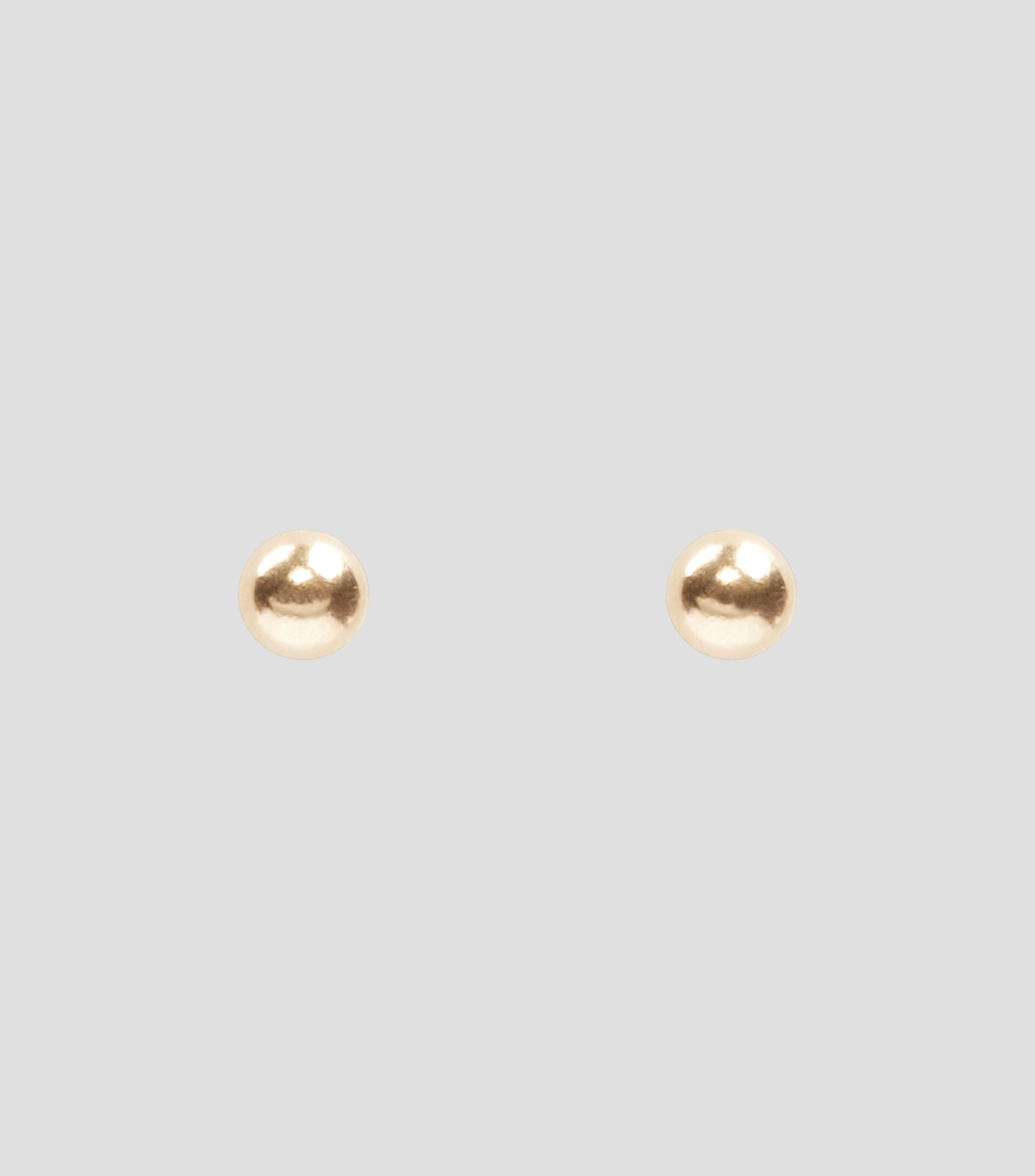 Aretes en oro amarillo de 18 kilates Mujer