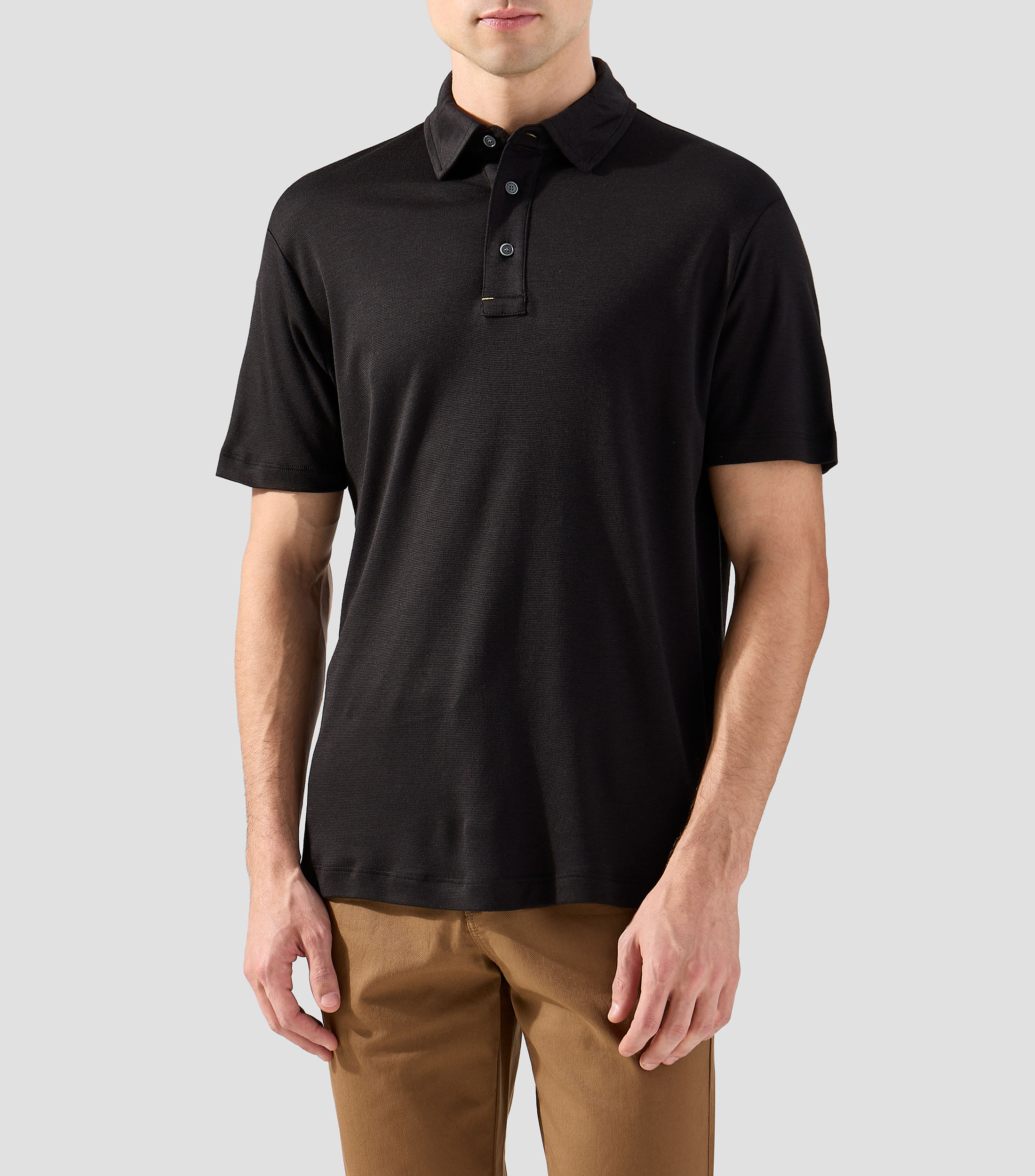 Playera tipo polo con manga corta lisa Hombre
