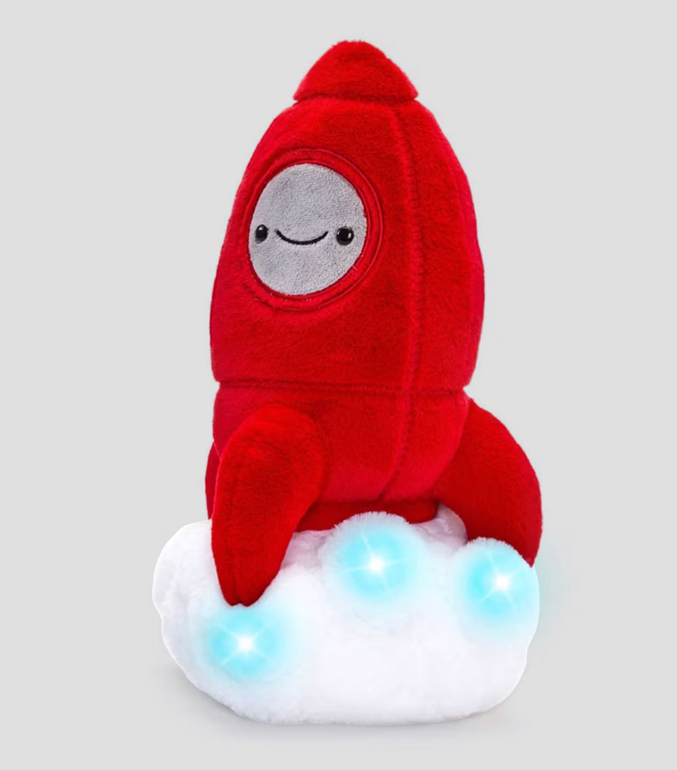 Cohete espacial de peluche con luz y sonido