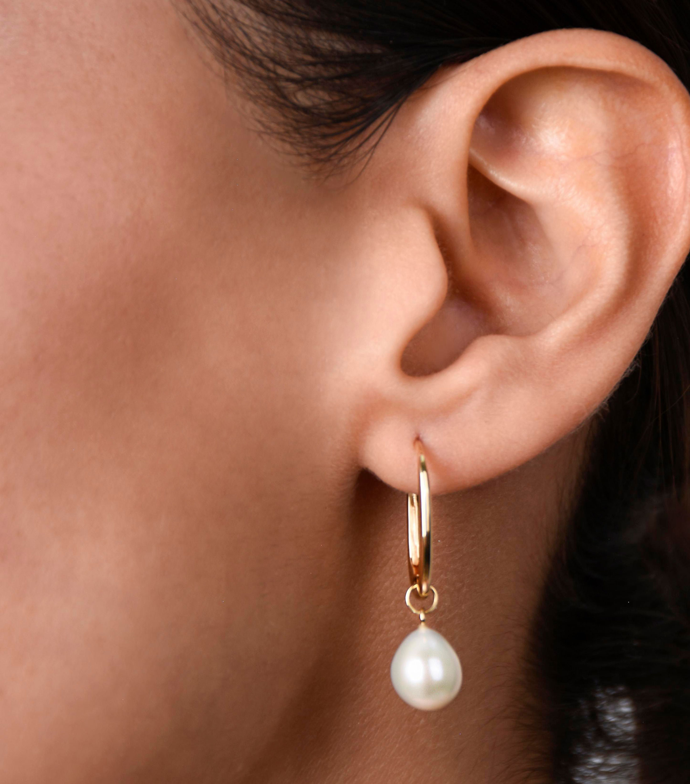 Aretes en oro amarillo 18 kilates con perla Mujer