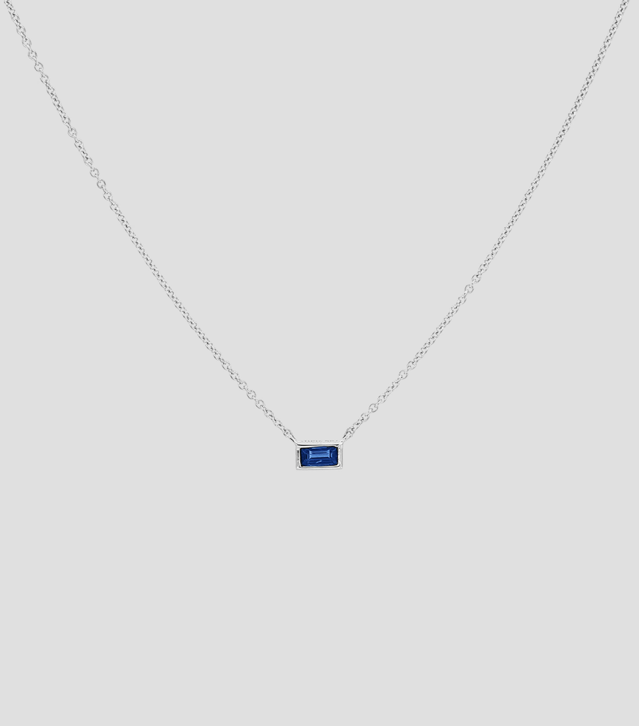 Dije con Cadena Consent en oro blanco de 18 Kts Mujer