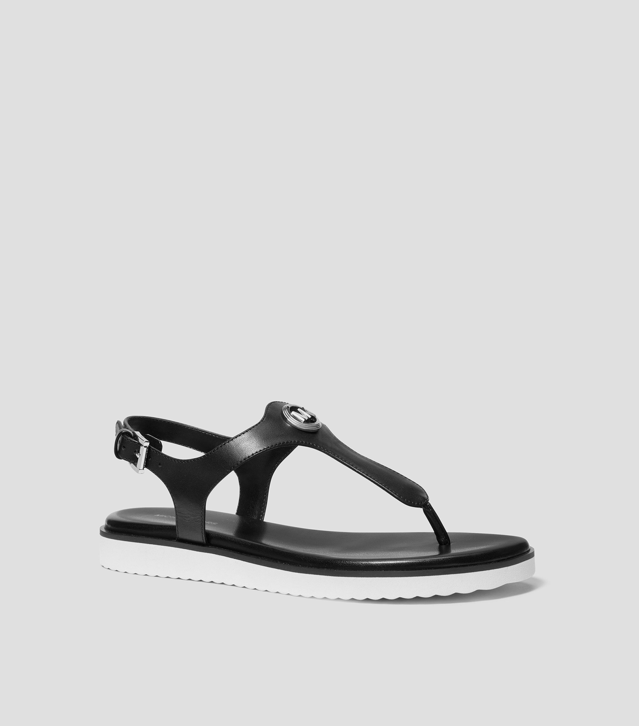 Sandalias Planas en piel Mujer