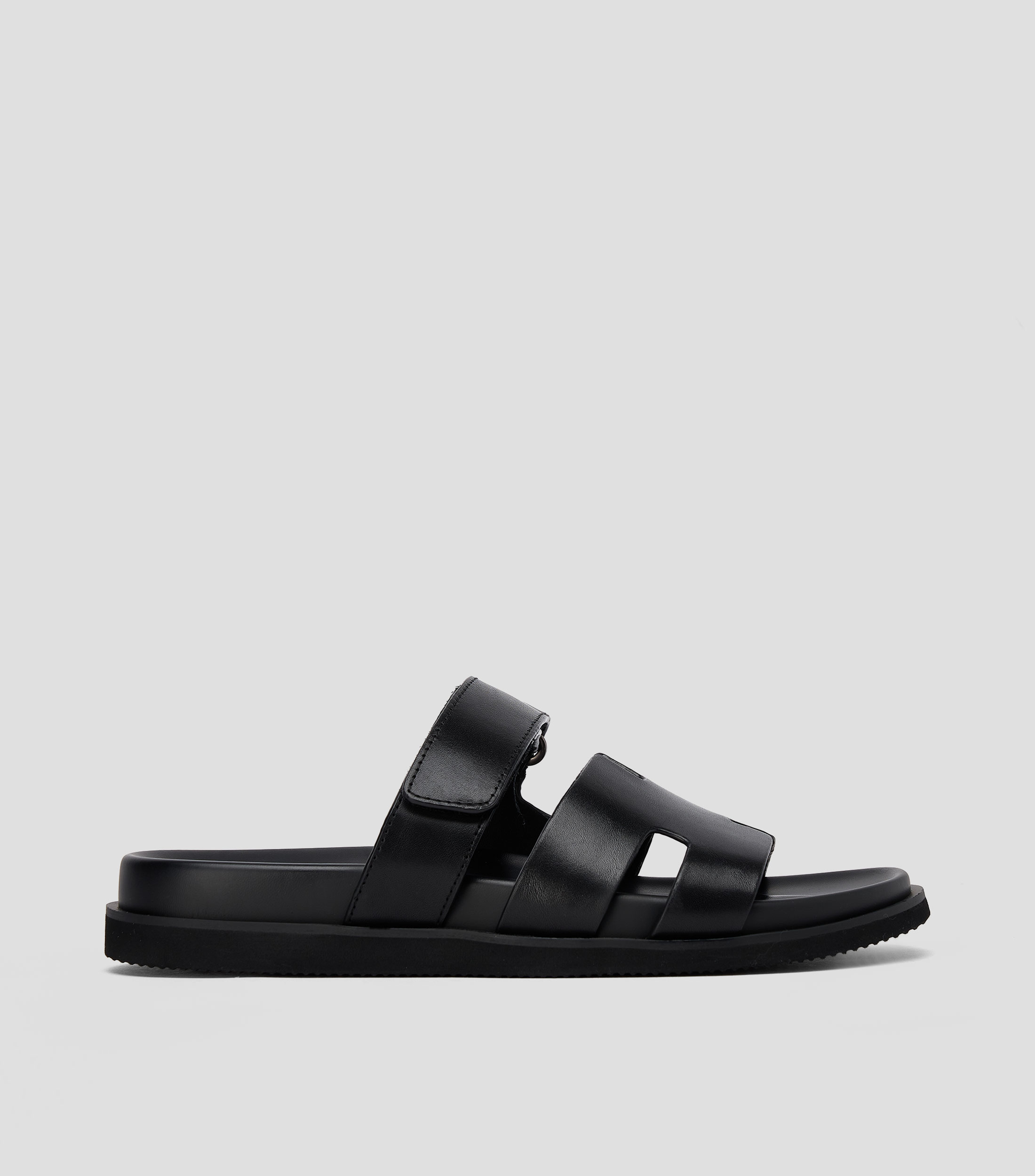 Sandalias Planas en Piel Hombre