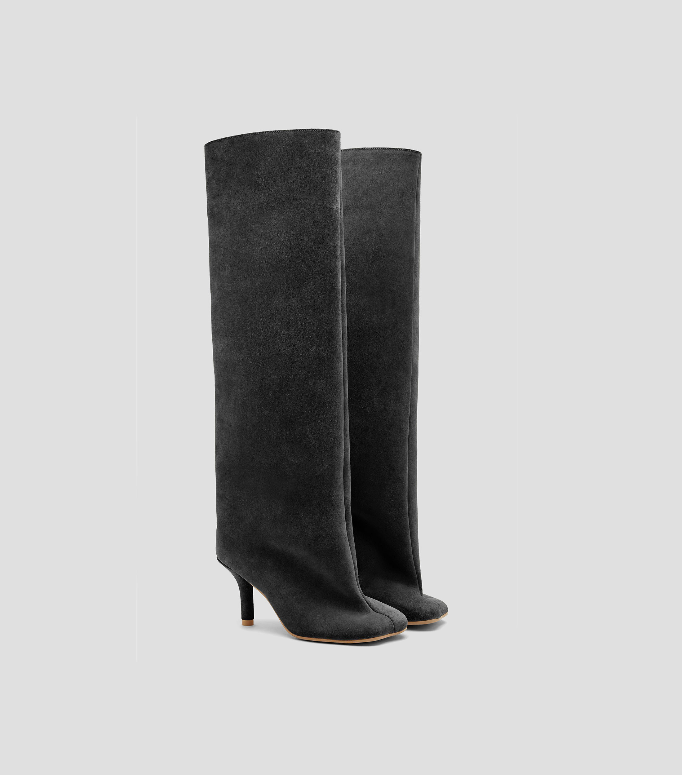 Botas largas en piel tacón alto aguja Mujer